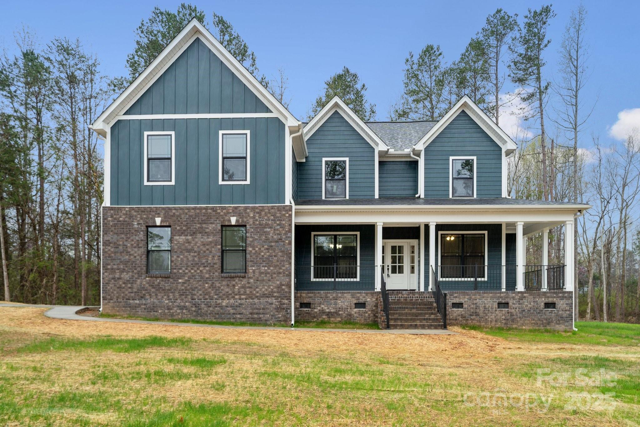 This is the one you have been waiting for! Newly completed construction, located just under 2 miles from the center of town, and just minutes from the Lake Wylie area will give you the convenience of local shopping, restaurants and parks with the privacy you've been looking for. Truly a hidden gem! This beautiful custom built home sits on 4.5 acres with its own pond. The stunning 4 bedroom, 2 1/2 bath home boasts a large back porch with a view of the pond, perfect for drinking your coffee or entertaining guests. Features include Pella windows, a tankless gas water heater and ventless gas fireplace. This home has beautiful, bright color choices and gorgeous countertops and fixtures. With a very large bonus room, an office, 2 pantries, a large laundry room and dining area you will have all the space you need. You get all of this in the award-winning Clover School District.