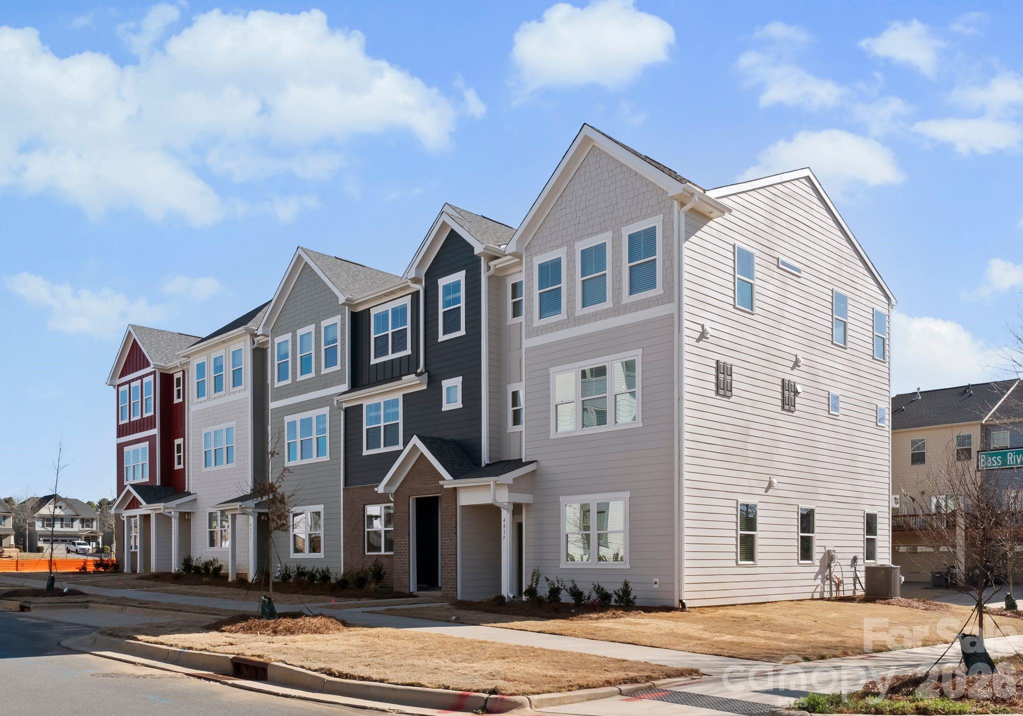 NEW CONSTRUCTION MOVE IN READY! Discover upscale living in this modern three-story townhome in desired City Park Neighborhood! Featuring a flex space office/study on the main floor, as well as, three bedrooms and two full baths on the third floor with a half bath on the second. The open-concept second floor showcases a chef-inspired kitchen with stainless steel appliances, quartz countertops, tile backsplash and designer lighting. The primary suite offers plush carpeting, a walk-in closet, and a double vanity en-suite showcasing a floor to ceiling tiled shower. Enjoy a generous rear deck, perfect for entertaining, and the convenience of a private two-car garage. An unbeatable location a few miles from Southend and Uptown Charlotte, as well as, walkable to attractions such as Charlotte Regional Farmers Market, Starbucks, Chipotle, Panera and more! Schedule your showing today!
