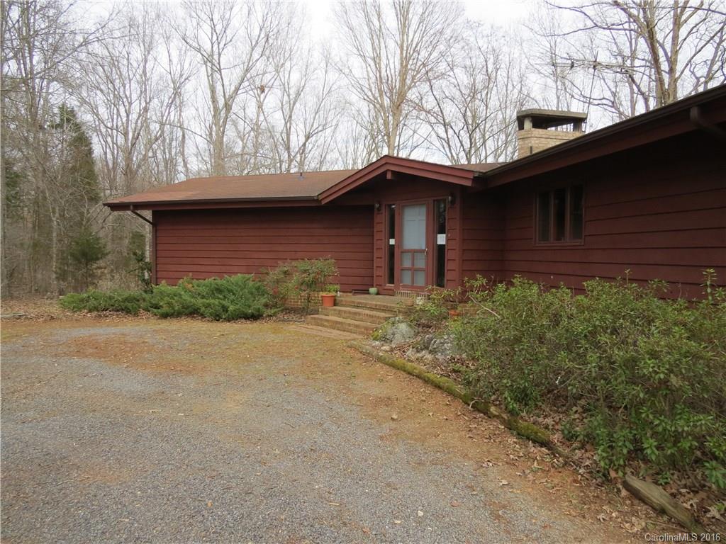 Sprawling Contemporary Ranch With Mountain-Like Setting. Front Door Entry with Brick Floor Leading to Hardwood Floors. Great Room with Brick Masonry Fireplace. Study With Built-In Shelves. Large Windows With Views of Wooded Area. Master Suite on Main Level. Brick Wall Leading to Lower Level Great Room with Masonry Fireplace. Large Deck.  Landlord will maintain the pasture. On 49 Acres