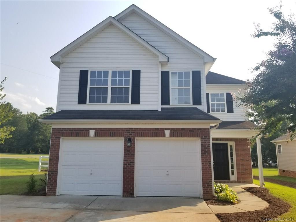 This stunning, 3 bedroom 2 and a half bath home in Rock Hill is perfectly placed on a corner lot with a HUGE fenced in yard! Inside, find brand new flooring, carpet, appliances and freshly painted from ceiling to trim. NO MORE POPCORN CEILINGS! Air conditioner replaced in 2016. Backyard features a patio with a brand new pergola! Don't miss this gem! Best part, schools have a sidewalk just minutes away connecting the neighborhood to schools.