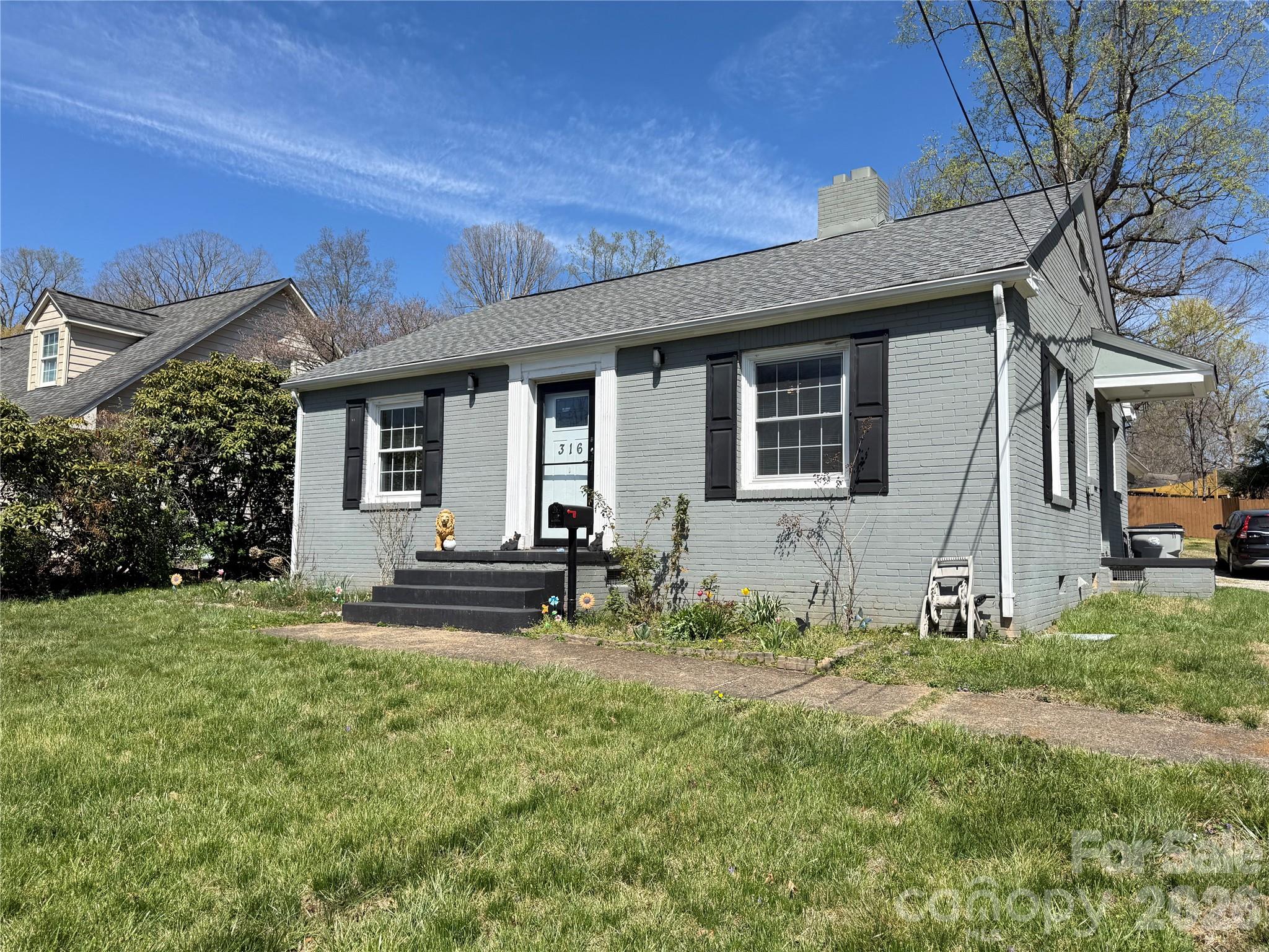 Enjoy The Convenient Location of This Wonderful Property, It's In Town Living At It's Best. Walk, or bike, to shopping & dining. A new sidewalk is being install on adjacent street. The owners have taken great care of this property and added some beautiful updates. Inside and out, has a fresh coat of paint. The kitchen has been updated and features granite countertops, custom tile backsplash & new tile floors. The hall bath has been remodeled and features a custom tile tub/shower and new tile floors. Hardwood floors are in like new condition. Lots of room for entertaining, or family gatherings, with a large formal living room and large den. Large den also has the potential for office space, or media/playroom. Inside also features an attic storage room. Outside has level back yard, large carport that can double as a covered outdoor area for entertaining and storage room. Roof is less than 3 yrs old, HVAC less than 2 yrs old, and new water heater has been installed.