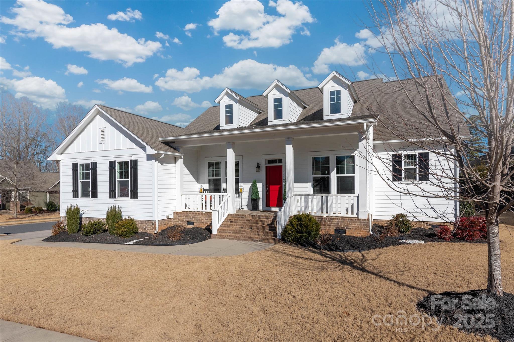 Welcome to this stunning home, situated on a corner lot, offering a seamless blend of elegance & comfort. Enjoy the charm of the front porch or host unforgettable gatherings by the heated, inground saltwater pool & covered patio. The main floor features a well-designed layout with an expansive primary suite & generously sized guest suite surrounding the main living area. A gourmet kitchen overlooks the family rm & dining area, creating an inviting open-concept living space; boasting stunning granite, a large island, gas cooktop & wall oven. Upstairs, 2 additional BR's, each with their own baths, are enhanced by a generous loft & access to walk-in attics; offering potential for a 2nd office, den, or game room. 3-car garage provides storage space to suit every need. Nestled within a Resort Style community featuring sidewalks, fitness center, & incredible pool area complete with water slide & lazy river. Combining style, comfort, & convenience! Showings start SAT 1/25. OPEN HOUSE 3-5 PM