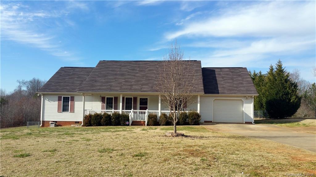 Well maintained ranch w/attached garage AND a 2-car 20x30 detached wired bldg on a level 1.08 fenced lot! New Carpet in bedrooms, vaulted ceiling in large great room w/FP. Split floor plan, nice kitchen w/breakfast bar, pantry and lots of counter space. Unheated office/bonus/storage area. Deck on back and lg. covered Southern front porch. USDA eligible.