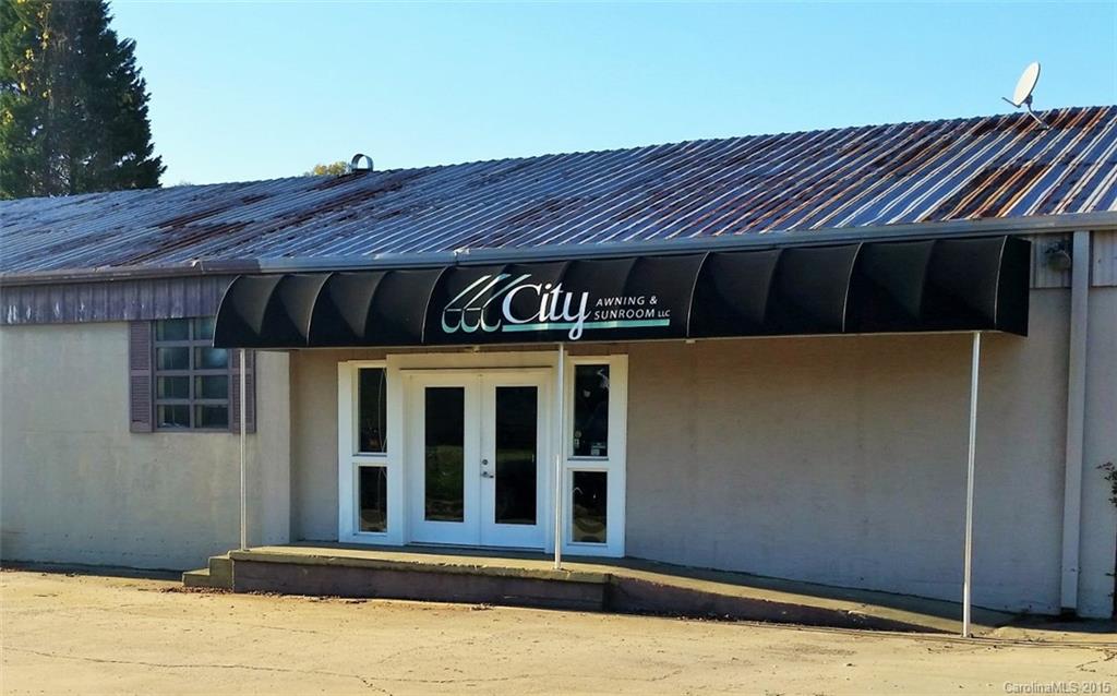6200 +/- square foot concrete building on 1+/- acres. GC zoning. Off Cherry Rd near Cherry Park. Possible owner financing available.