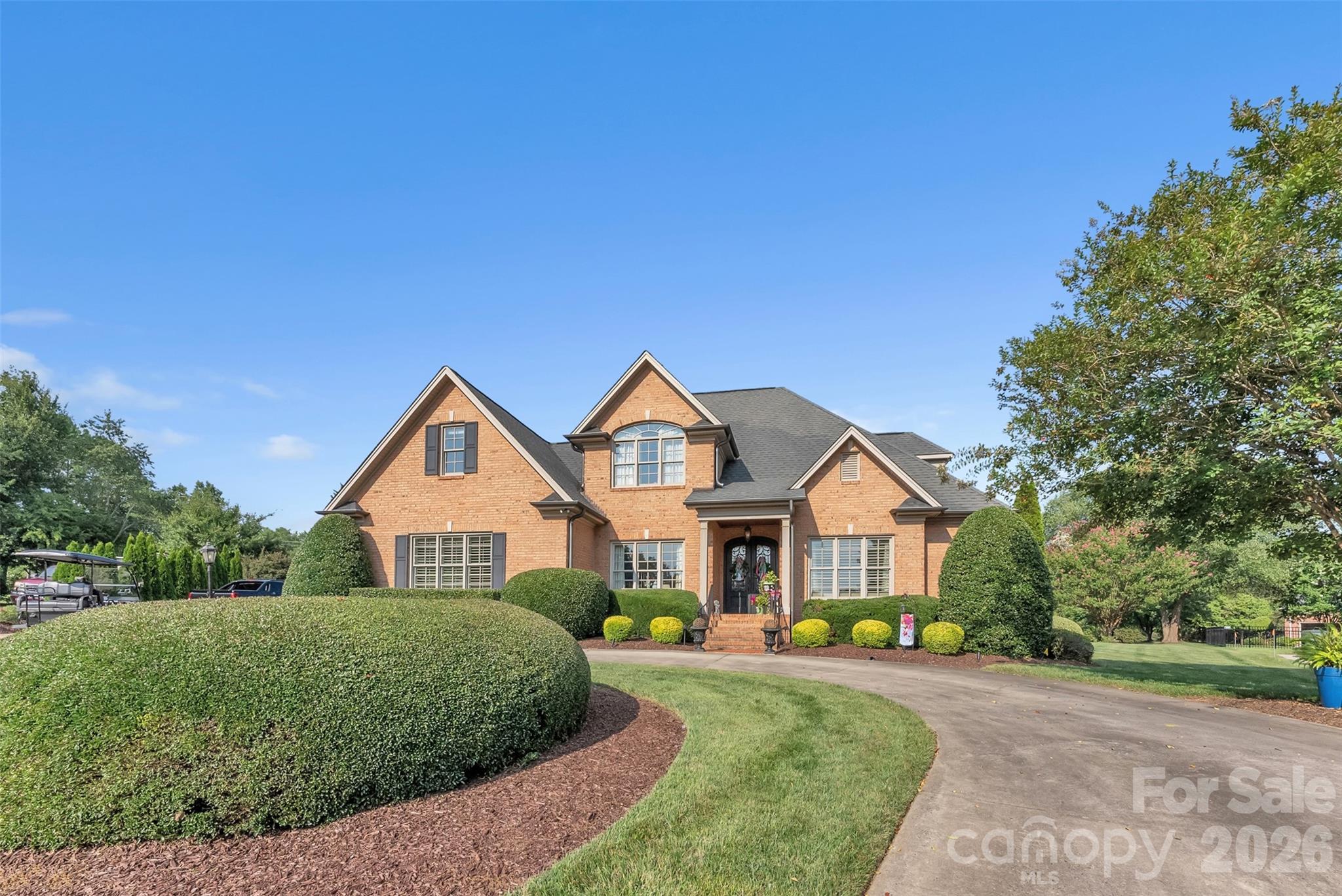 This incredible 4-bedroom, 3.5-bathroom home with an Office & bonus room is a custom-built full-brick beauty located in the highly desirable Gaston Country Club. The home boasts high-end features, Outdoor lighting including metal-clad windows and metal Clark Hall double doors, French oversized gutters, and plantation shutters throughout, offering both style and durability. Inside, you will find an open concept with crown moldings & large windows that add charm to every room. The Ezy Breeze sunroom is the perfect place to relax, the outdoor living space is a true dream. Enjoy a large custom fireplace, a fully-equipped outdoor kitchen, and a fenced-in backyard—ideal for gatherings and enjoying the outdoors. The garage is equipped with epoxy flooring and built-in cabinets for maximum storage, while the large circle driveway offers plenty of space for parking and adds curb appeal to this exceptional home. Roof replaced July/2025.

LOCATION, LOCATION, LOCATION! Golf cart Community with an under 2-minute drive to Gaston Country Club & access to many other restaurants and stores!