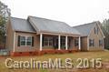 As close to new construction as you can get and still move in quickly.Built in 2014, this massive house on 5 acres has it all!Each bedroom has its own bathroom, lovely family room for entertaining,expansive kitchen with slate appliances and walk in pantry.Upstairs is a phenomenal unfinished bonus room that can be used for storage or can be finished out for extra square footage. Outside you can relax on the screened porch or chill in the two-story playhouse! Wired workshop and room for horses!