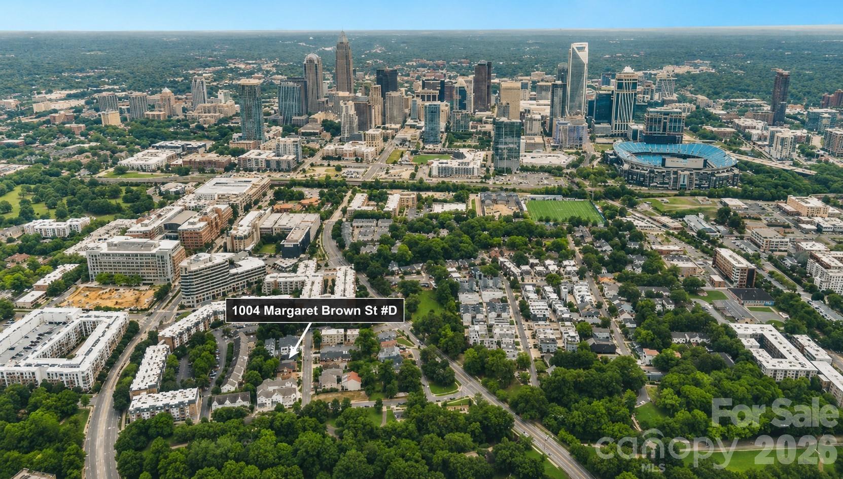 BEAUTIFULLY UPDATED AND MOVE-IN READY, this spacious luxury residence offers the perfect blend of modern style, walkability, low-maintenance living, and an unbeatable Uptown Charlotte location — all with low HOA fees and a 1/2% lender credit toward buyer closing costs through the preferred lender. Nestled in Charlotte’s highly sought-after Historic Third Ward, this light-filled 3-bedroom, 3.5-bath condo-style home features a private rooftop terrace, a 2-car garage, and easy access to Frazier Park, greenway trails, and everything Uptown Charlotte has to offer — all while tucked within a quiet neighborhood setting.

Designed for both everyday living and entertaining, the open-concept main level showcases 10-foot ceilings, abundant natural light, recessed lighting, fresh interior paint, and beautiful vinyl plank flooring throughout the main living spaces. New high-end window treatments throughout the home provide the perfect balance of light filtering and privacy. The sleek modern kitchen is the centerpiece of the home, featuring quartz countertops, a large center island, stainless steel appliances, a smart range, built-in microwave, pantry, and contemporary lighting. A spacious half bath adds convenience for guests.

Upstairs, the serene primary suite serves as a private retreat with a large walk-in closet and spa-inspired ensuite bath complete with a quartz vanity, custom tile work, and a frameless glass walk-in shower. A secondary bedroom with generous closet space is complemented by a beautifully finished hall bath with a custom-tiled tub/shower combination. The conveniently located laundry closet includes washer and dryer.

The third level offers exceptional flexibility with a spacious bedroom or bonus retreat featuring a custom-built Murphy bed, walk-in closet, additional storage closet, and full bath with a custom-tiled walk-in shower. Sliding and screened doors lead to the private rooftop terrace with pavers — the perfect place to enjoy morning coffee, unwind in the evenings, or entertain while taking in the city views.

Enjoy an unbeatable location just moments from Bank of America Stadium, Truist Field, Johnson & Wales, museums, restaurants, breweries, entertainment, and major interstates. Walk to Frazier Park, the dog park, and nearby greenway trails while enjoying the energy of Uptown living with the comfort of a tucked-away neighborhood feel. This exceptional Third Ward residence truly offers the best of Charlotte city living.