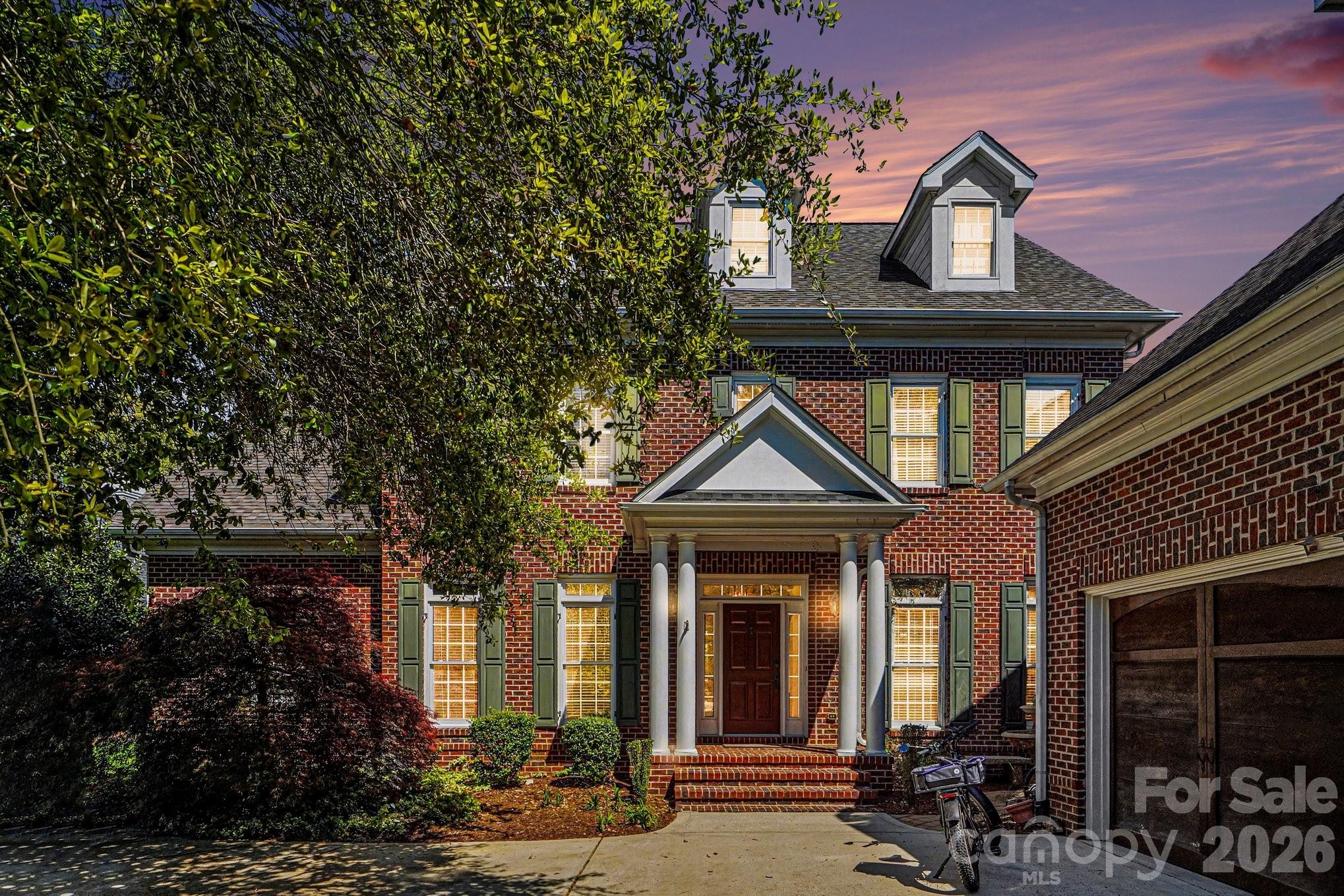 Rare opportunity to own in an intimate waterfront community of just 69 homes on Lake Norman including a BOATSLIP!

This exceptional home offers a main-level primary suite, private office, and a stylish bar area—perfect for entertaining. The sunroom has been seamlessly converted into a four-season room, expanding the living space and overlooking a serene backyard oasis.

Upstairs features four spacious bedrooms, while the third level includes a sixth bedroom, full bath, and versatile flex space—ideal for guests, a media room, or home gym.

Thoughtfully designed with high-end finishes throughout, the home showcases extensive hardwood flooring on the main and upper levels, detailed moldings, custom built-ins, and a gourmet kitchen that blends function and style.

Step outside to your own private retreat with tropical landscaping, a  patio,  and a heated pool with raised stone spa—perfect for year-round enjoyment.

The 3-car garage features epoxy flooring, ample storage, and approximately 468 square feet of additional space above. The sunroom, garage, and room over the garage are all equipped for enhanced comfort and flexibility complete with Mini-split systems for extra comfort year round 

This property also includes a deeded boat slip (approximately 14x28) located just down Windaliere—offering the ultimate Lake Norman lifestyle. (Boatslip is A36)

Professional photography and floor plans will be uploaded on April 7, 2026