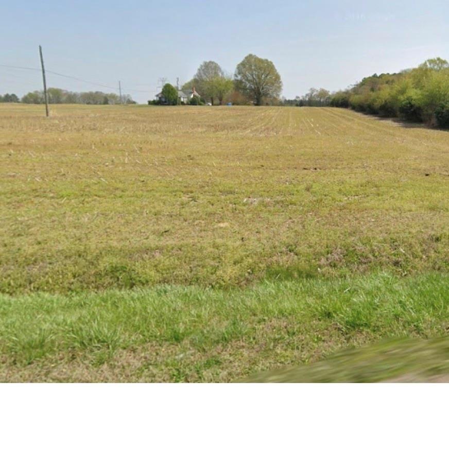 Prime Development Opportunity in Growing Midland Corridor
This exceptional ±14-acre development site features approximately 441 feet of road frontage along Highway 601 in the accelerating Midland corridor near a busy intersection with outstanding visibility and accessibility. Positioned in a high-growth area, this property offers tremendous potential for future development opportunities.
The property features generally flat topography, making it favorable for site work and development. Water and sewer access are available, and the site’s strong road presence, excellent visibility, and high traffic counts support a wide variety of potential uses. Whether for retail, office, service-oriented businesses, mixed-use concepts, or long-term investment purposes, the possibilities are extensive.
Surrounded by expanding residential growth and an increasing mix of commercial businesses, this property presents an outstanding opportunity for developers, investors, and owner-users seeking a strategic location with long-term upside in one of Midland’s fastest-growing areas.
Conveniently located just minutes from Charlotte, Harrisburg, Mint Hill, Locust, and Interstate 485, this property offers exceptional regional access within a thriving and expanding community.
Zoned Single Family Residential; however, the property is identified for future commercial use within the Midland Future Land Use Plan. The property also includes an approximately 1,400-square-foot home that is being conveyed at no assigned value.
The property is currently enrolled in the tax-deferred farm program, which may continue if the new owner qualifies and elects to maintain participation.
Buyers are advised to independently verify all information, including zoning, setbacks, permitted uses, utility availability, water and sewer access, tap fees, and development requirements with the Town of Midland Planning Department.
No sign on property.
Shown by appointment only. Please do not enter the property without a licensed REALTOR® and a confirmed showing appointment through ShowingTime. Contact the listing agent with questions 
Please see attached deed and legal description.