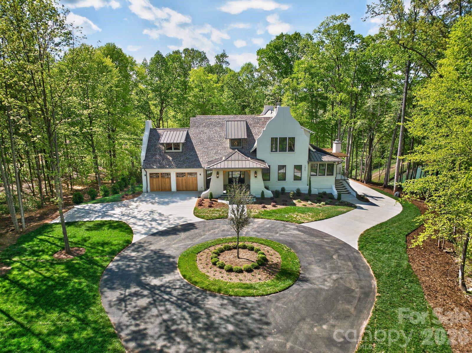 The Kiser is the latest collaboration between Craft Design Studio and Grandfather Homes, offering an idyllic retreat with expansive outdoor living, a resort-style pool and fire pit, and peaceful pond views. The grand yet comfortable great room features a radius dome ceiling and opens to a covered terrace with a wood-burning fireplace, creating seamless indoor-outdoor living. Designed for entertaining, the kitchen includes a separate scullery, dry pantry, and casual dining room. Main-level primary suite and private office provide everyday convenience. The lower level offers an incredible recreation and entertainment space with a glass garage door opening directly to the pool—ideal for a man cave, car collector lounge, or additional showcase garage—along with a dedicated exercise room. Upstairs, four spacious bedrooms include a second primary suite for added flexibility. Two attached 2-car garages (4-car total, or up to 6-car capacity with the conditioned bonus space) and an optional elevator upgrade for long-term livability. At Ventosa at Mattie Rose, every moment is an opportunity to embrace a lifestyle of peace, beauty, and modern convenience. This community is a sanctuary where you can rejuvenate your spirit and inspire your daily life.