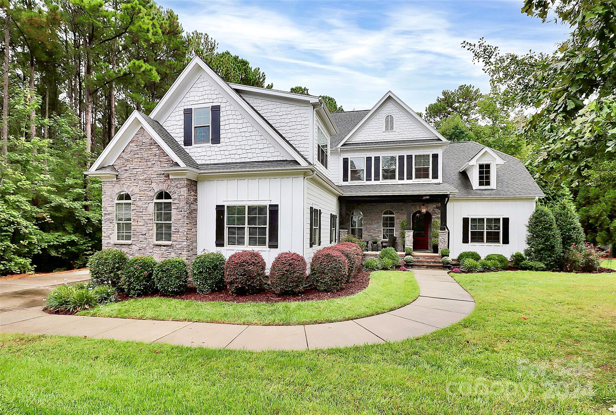 Welcome to a stunning freshly painted 6BR, 4.5BA home nestled on.57 acre beautiful, landscaped, corner lot in Handsmill on Lake Wylie. Community feautures a pool, fitness, & beautiful club house. Spacious home offers luxury at every turn starting w/covered FT porch and arched wood door opening to the grand foyer. Foyer flows into great room, w/stone gas FPL, and coffered ceiling. Update kitchen, w/new countertops & backsplash,glass cabinets w/pull out drawers, for pantry & pot storage,marble Isl, bev fridge, forrmal dining boasts a new chandelier, tray ceiling, and wainscoting. Primary suite on maineatures a wonderful bath w/soaking tub,shower, 2vanities & massive closet with built-ins. Guest BR is on main w/adjacent BA. Hdwd floors on main and living area upstairs. Upstairs is a spacious loft, wet bar, and 4BR, 2.5 BA. Separate stairs to a bonus/office. Relax in screened porch w/outdoor kitchen and gas stone FPL or enjoy the outside on the lovely brick patio and beautiful backyard.