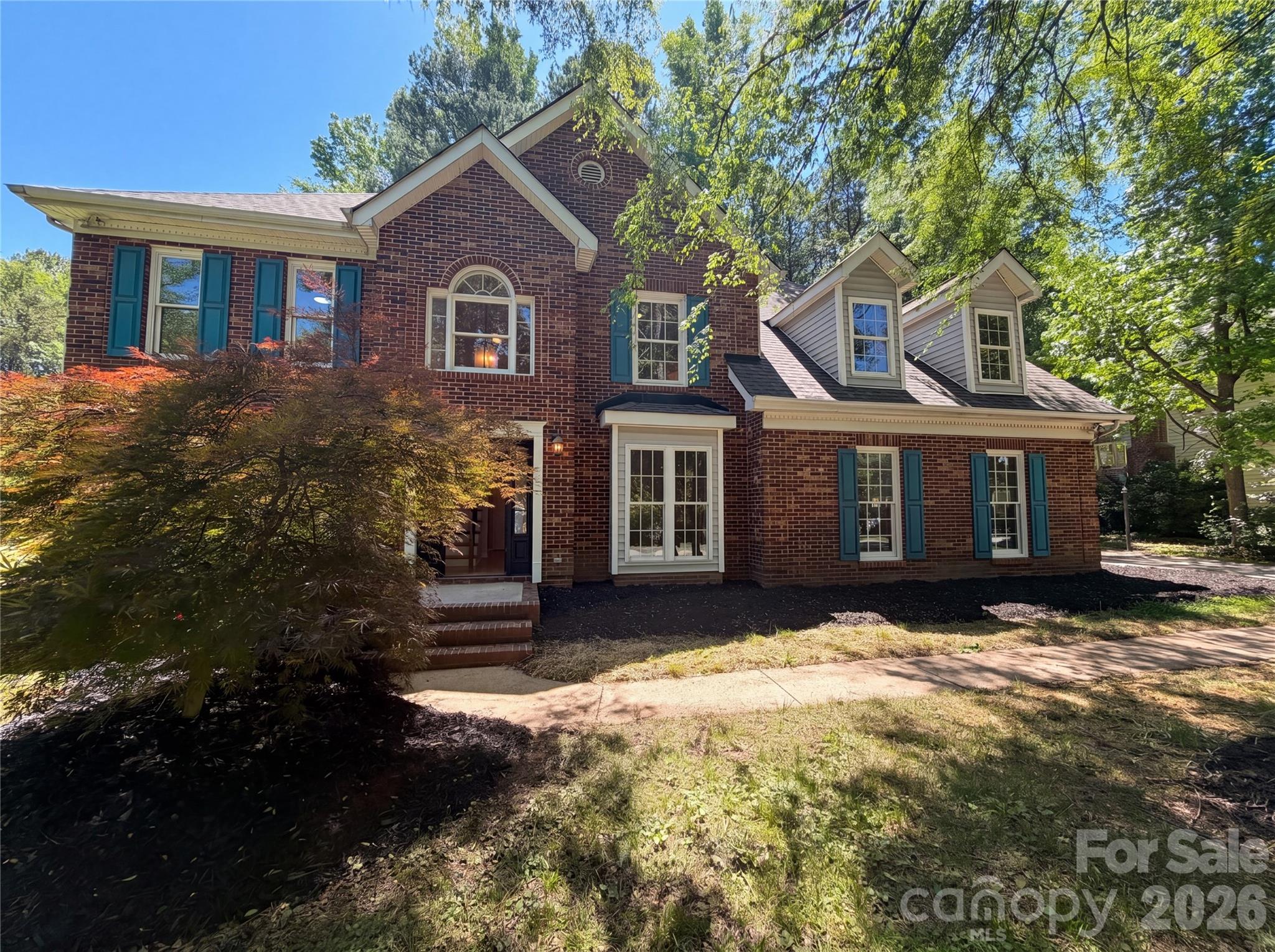 Beautiful 5-bedroom home in Charlotte offering a fantastic floorplan with spacious rooms designed for comfortable living and entertaining. The inviting living area features a charming brick fireplace that adds warmth and character to the home. Generous bedrooms provide plenty of space for everyone, while the large yard offers endless possibilities for outdoor enjoyment, gardening, or relaxing evenings at home. Conveniently located near shopping, dining, and major highways, this home combines space, comfort, and location all in one!