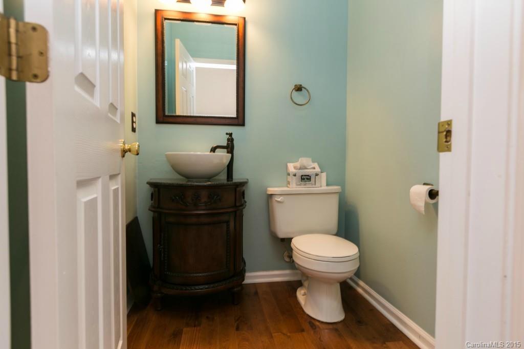 Corner lot, 2 story w/flat fenced rear yard in popular Regent Park! New wood laminate floors on main, remodeled half bath, formal dining room w/bay window, formal living (or convert to home office)!  Kitchen w/full white appl. pkg, gas stove & large breakfast area opens to family room w/gas fireplace! Exit door from breakfast area leads to rear deck. Spacious master suite w/sitting area, 5 piece bath, walk in closet & walk in attic storage. New roof Nov. 2014, HVAC 2 yrs old! USDA 100% financing