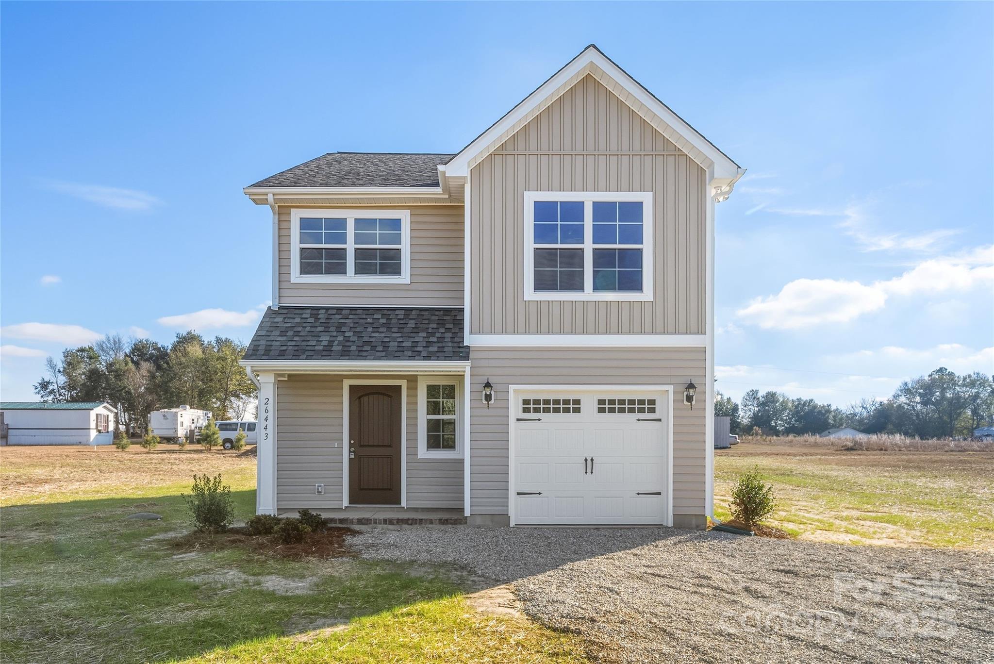 JUST REDUCED New Construction under $250,000 - This brand NEW home sitting on .79 acres with NO HOA's is calling you HOME! Small front porch, 3 bedrooms and laundry room upstairs. Open floorplan with kitchen, dining and family room all together. Easy access to the highway and just minutes from shopping, dining and commuter routes. Downtown Pageland just 3.5 miles away. Fantastic finishes in this beautiful home, open kitchen with large island, quartz countertops, stainless steel appliances, breakfast area and large family room. Sliding doors to outside patio. One car garage with garage door opener already installed. Great for a first time buyer, someone who wants a new home or investor. Please schedule an appointment to view this property ASAP it won't last long!! USDA Eligible 100% financing. Must close with Builders Preferred Closing Attorney MEEK LAW.