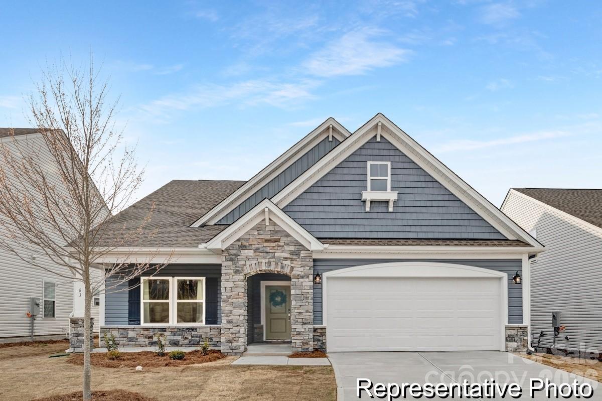 Heritage Hall is Statesville’s newest semi-custom home community, offering just 30 homesites on spacious half-acre-plus lots. The Montcrest was the first ranch floorplan that we ever designed, and it has continued to be our most popular floorplan. The Montcrest boasts a flexible range in size, spanning from 1,847 to 3,073 square feet, accommodating 3 to 6 Bedrooms and 2 to 4.5 Bathrooms. As you step inside, you're welcomed by Bedroom 2 and a Full Bath on the left, followed by a stunning formal Dining Room. Beyond that lies the Butler's Pantry, leading to the spacious Designer Kitchen and Nook Area. The Montcrest features a generously sized Great Room, with the option to include a cozy Fireplace, perfect for gatherings. The Montcrest's first floor also encompasses a spacious Primary Suite with a beautiful Primary Bathroom and a generous walk-in closet. Additionally, you'll discover a versatile Third Bedroom at the back of the home, which can efficiently serve as a home office. Completing the first floor is a large Covered Lanai, providing an ideal evening outdoor space. For those needing extra space, consider the Optional Bonus Room on the 2nd Floor above the Garage. This addition offers the flexibility to create a Bonus Room, loft, another Bathroom, or even an additional Bedroom. The Montcrest floorplan offers a range of customization options to tailor your home to your specific needs and preferences. Your ideal space awaits with the Montcrest. As a semi-custom home, buyers can choose selections and personalize with upgraded features.