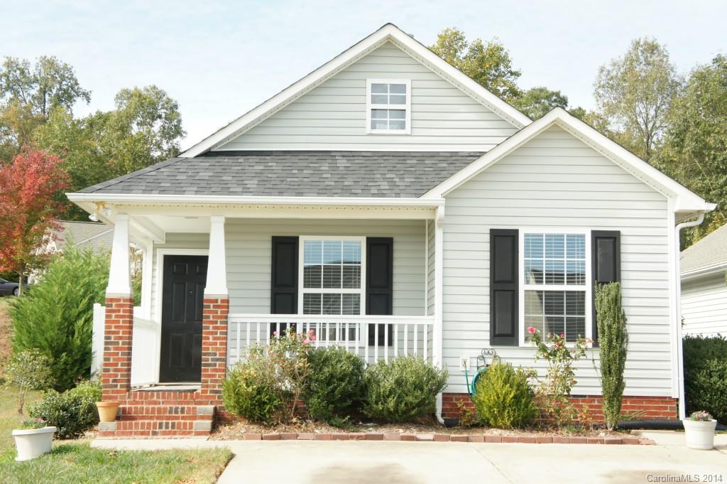 This cute home has an open floor plan with vaulted ceilings, large kitchen with bright breakfast area overlooking private fenced yard. New laminate floors.   Immaculate and spacious corner home!    Bedrooms are spacious, master bedroom with walking closet, Fort Mill Schools. New roof installed 2014.  Just minutes from Hwy 77, Low SC taxes!