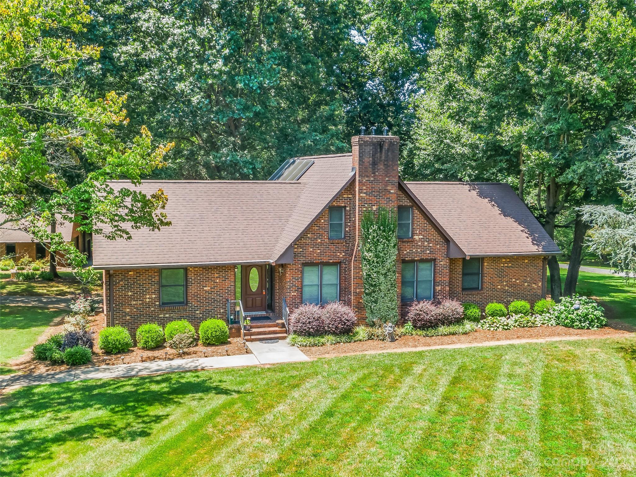 Join our exclusive online auction!This remarkable property, situated on over 4 acres of land, boasts a charming rustic home and a fantastic detached garage/workshop that will fulfill all your needs.Located in rural Davie County, it offers convenience to both town and I-40, with just a short drive to Winston Salem.The auction listing price reflects either the tax value or the current high bid + the buyer's premium.To participate, review all auction terms and register to bid.This property is a haven for auto or recreational vehicle enthusiasts, featuring over 7 covered parking areas.The park-like setting provides a picturesque backdrop, making it an ideal spot for your dream home.Inside, rustic interior exudes the cozy atmosphere of a mountain getaway.The standout feature is the enormous sunroom/great room, highly sought after by homeowners.One owner, custom built.Hot water stove is auxiliary heat source.Bid today!Secure your chance to become the proud owner of this exceptional property.
