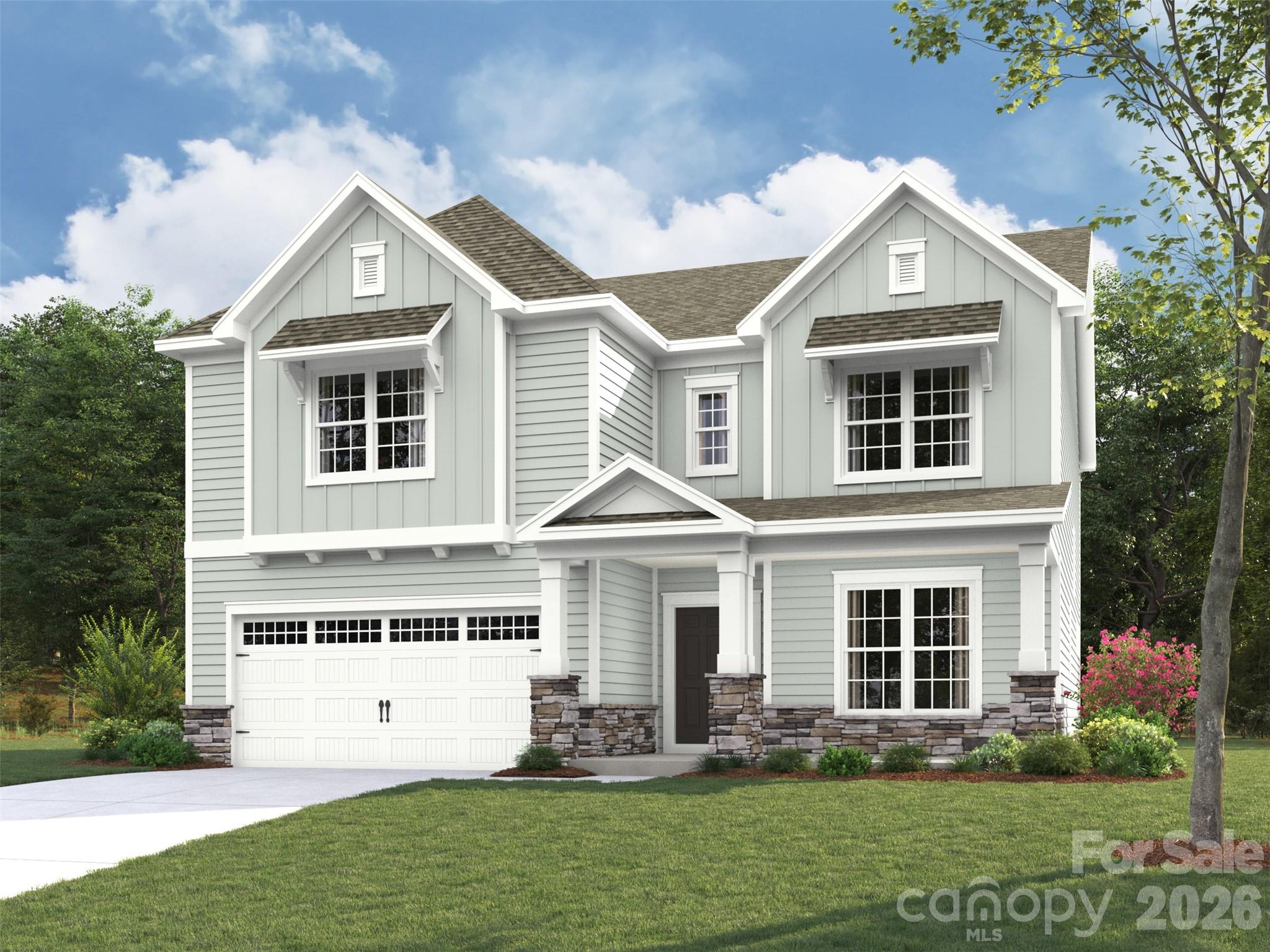 Spacious and Open Kingston plan on a terrific home site right across from the community amenity center, pool and playground. Ideal guest bed down with full bath and walk-in tiled shower. Primary bed up plus an open loft and 3 additional beds. The home's family room includes a cozy gas log fireplace with built-in cabinets on either side of fireplace. Front porch plus a rear covered deck overlooking the rear yard. Large kitchen with shaker style cabinets. Just off the kitchen is the spacious dining room which is wrapped in windows and light. Family room also right off kitchen for the perfect entertaining spaces. Quartz counters, tile back-splash, and gourmet split cooking stainless appliances and walk-in pantry. Plenty of countertop space with the large center island. Mud room with drop zone to keep it all organized. Premier suite up with decorative tray ceiling and large walk-in closet. Premier bath features a separate garden tub and walk-in tiled shower. Lots of warm, medium toned luxury vinyl plank flooring throughout. Amenities include a cabana, pool, playground and natural walking trails.
