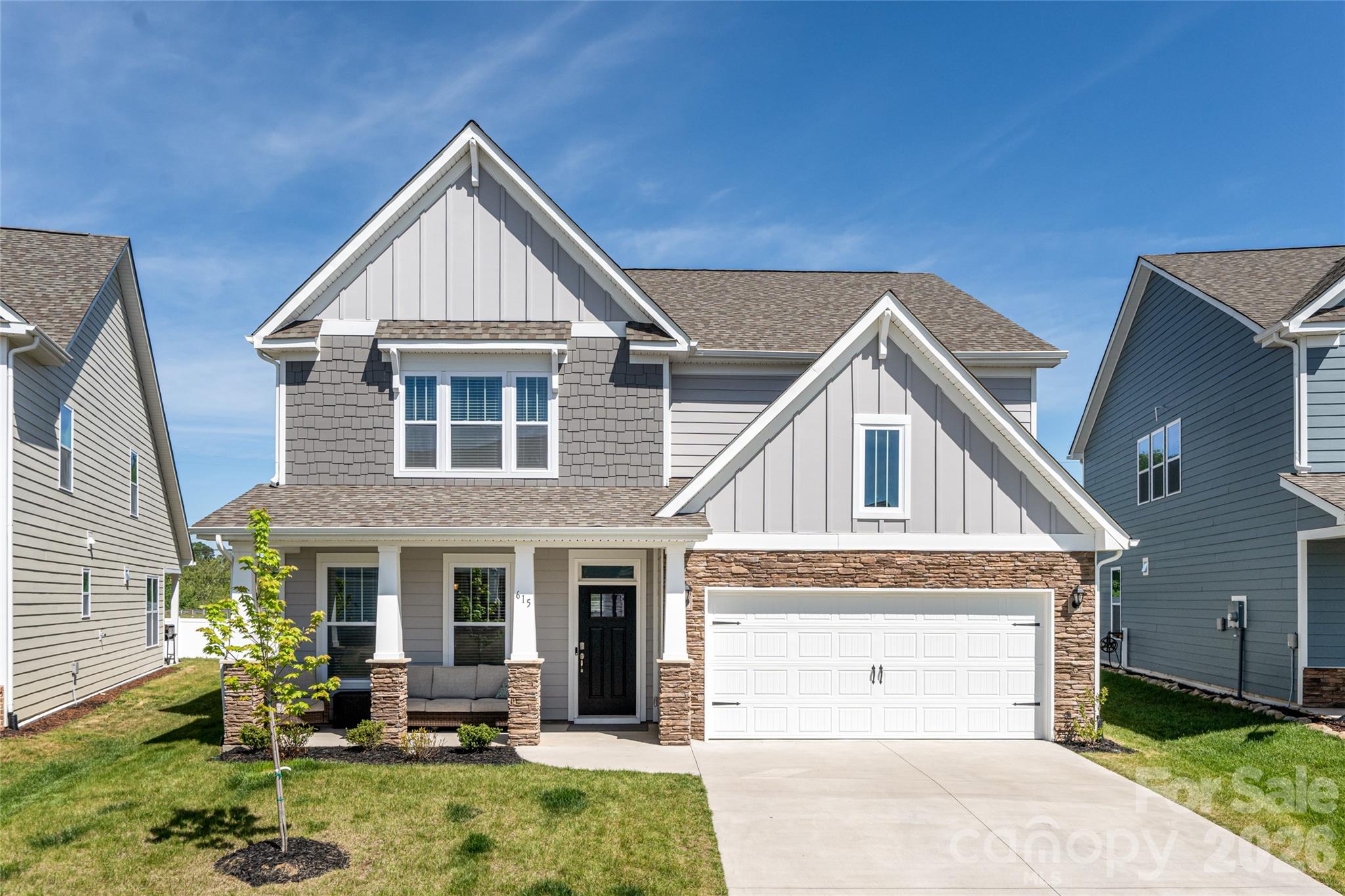 Welcome to 615 Fox Cove Road, a spacious and inviting home located in the desirable Cantrall Hills community of beautiful Hendersonville. With multiple living spaces, a functional layout, and thoughtful upgrades throughout, this home offers the perfect blend of comfort, flexibility, and everyday convenience.

The main level features a guest bedroom that works well for visitors, a home office, or flex space, along with open and connected living areas designed for easy everyday living. The living room features a cozy fireplace and large windows overlooking the backyard, creating a warm and welcoming feel. The kitchen offers a center island, breakfast nook, upgraded butler’s pantry, and a large walk-in pantry—providing plenty of prep space and storage for both entertaining and daily life. The main level also includes a formal dining room, mudroom, and easy access to the two-car garage.

Upstairs, the spacious primary suite feels like a true retreat with an oversized walk-in closet, en-suite bath, and a separate sitting area or office space—perfect for working from home, reading, or simply unwinding. The primary bath includes dual vanities and a large walk-in shower. The upper level also features a large family room, two additional guest bedrooms, a full bathroom, and an oversized laundry room with a utility sink.

Outside, the backyard offers a private and usable outdoor space with additional landscaping for privacy, along with a patio ideal for grilling and entertaining. The front porch is the perfect place to relax and enjoy the open green space located just across from the home.

Designed for the way people truly live, this 4-bedroom, 3-bath home combines spacious living areas, practical design, and comfortable living throughout. Cantrall Hills offers an impressive lineup of amenities including a clubhouse, pool, fitness center, playground, dog park, sidewalks, and street lights—all just minutes from downtown Hendersonville.