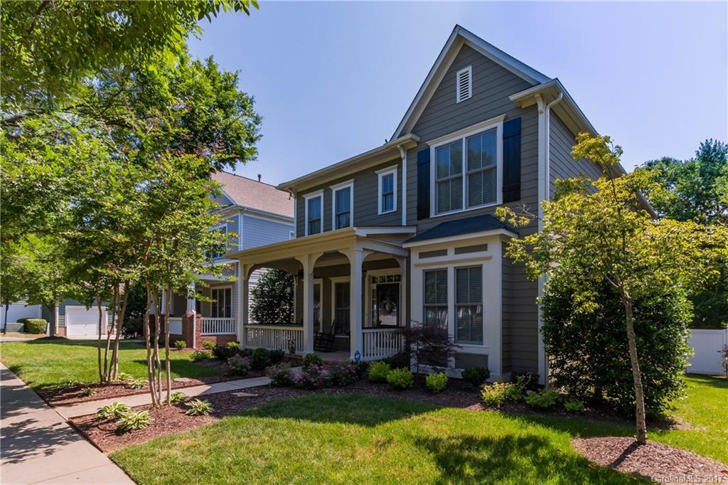Beautiful Colonial in the Heart of Baxter Village with a large covered front portch . Walk down the tree lined streets to shops, restaurants, gym, library and Elementary School. An amazing kitchen with light cabinets opens  to  a large family room.  10 foot Ceilings on the main level with heavy moldings. Large Master Bedroom Suite with a remodeled shower. Full irrigation.  Rear Yard is fenced w/a courtyard feel. Covered walkway connecting the garage to the home. Nice Loft/Play area on 2nd floor.