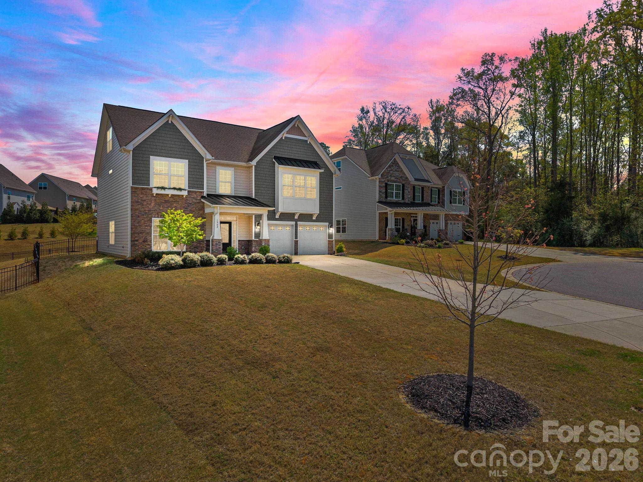 Welcome to this stunning 3-story retreat in the highly sought-after Waterford on the Rocky River community. Designed for modern living, the main floor features a true Chef’s kitchen that flows seamlessly into the family room and casual dining area—perfect for hosting. Need a quiet workspace? The main level includes a dedicated office with French doors, plus a formal dining room for special occasions.

Retreat to the second floor, where you'll find the laundry room and four spacious bedrooms, including a luxury Primary suite with a spa-like bath. The third-floor "bonus" level is a game-changer, offering a fifth bedroom, full bath, and a second family room—ideal for a teen suite or media room. Enjoy the outdoors in your private, fenced-in backyard or take advantage of the neighborhood’s resort-style pool and playground. Perfectly positioned with easy access to Concord, Kannapolis, and Davidson!