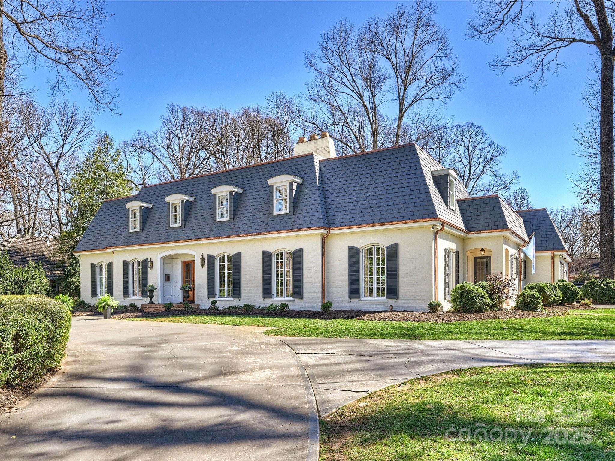 Welcome to coveted Lemon Tree Lane in Foxcroft. This spectacular home exudes casual elegance & charm throughout. 9'2 ceilings on main, gorgeous molding & hardwoods. Inviting foyer, wood paneled office, living room & dining room w/ lrg front windows. 3 wood burning fireplaces with gas starters. Primary on main w/ his & her closets, Bianco Avion Marble countertops in primary bath, jacuzzi tub, steam shower & heated floors. Kitchen is a cook's dream, w/ Bianco Avion Honed marble countertops, large island, breakfast area, 8 burner Viking gas range/custom hood, Sub-Zero frig, Fisher Paykel dish drawers & tons of cabinet space. Scotsman ice pellet in den w/ windows overlooking covered porch perfect for entertaining outside & a private flat back yard you won't believe! Bonus/media room with half bath, wet bar, beverage frig & 2nd ice maker. Laundry room, drop zone. Upstairs 2nd primary w/ dressing room/full bath, 3 bedrooms & add'l full bath. New copper gutters. Shed w/ attic storage space.
