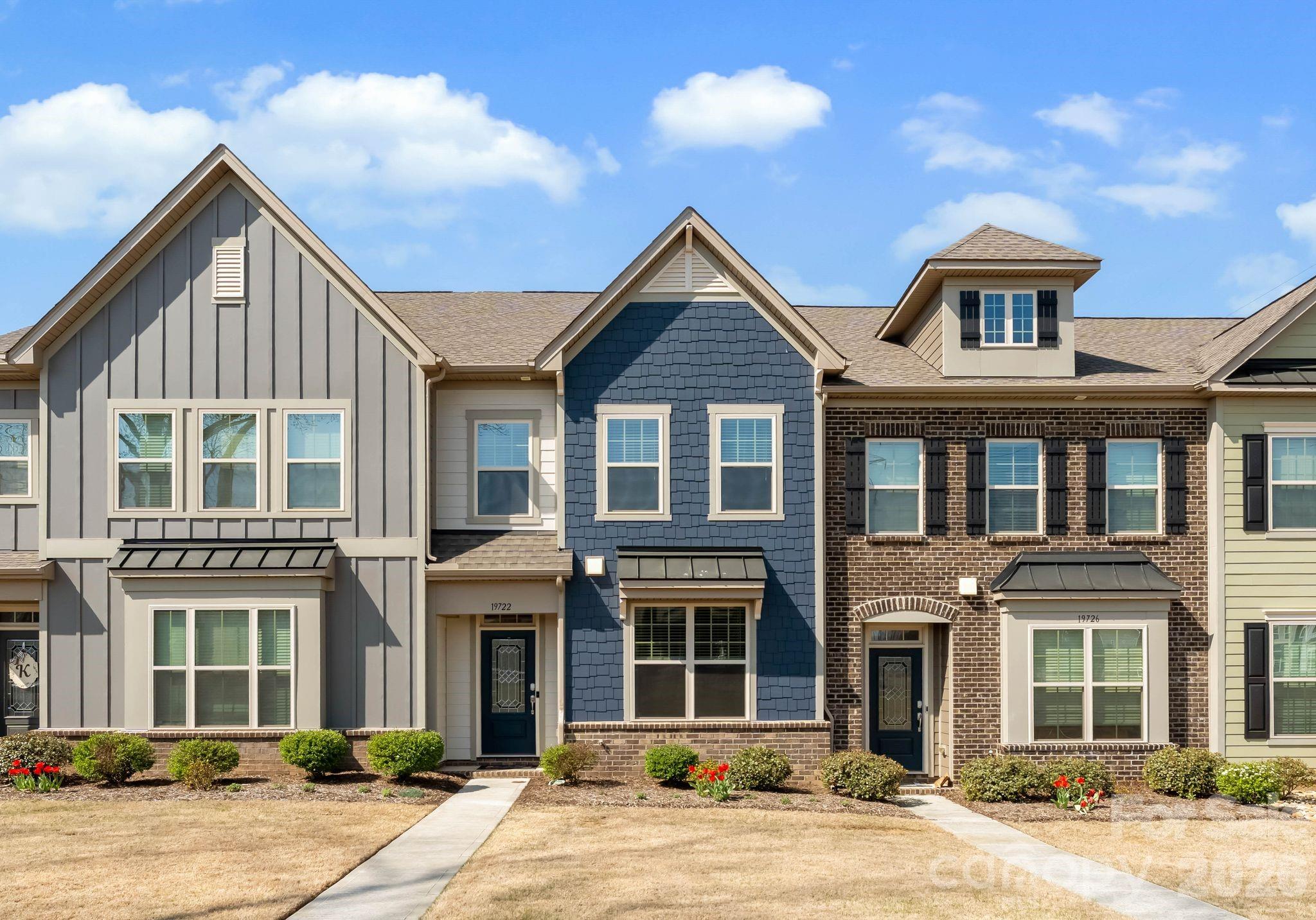 Ideally positioned in the heart of WestBranch, this Davidson townhome stands out with its close proximity to the neighborhood pool and open green space, offering a convenient and connected lifestyle just outside your front door. Featuring over 2,000 square feet of living space, the open-concept main level includes a private office, a spacious living area with a gas fireplace, and a well-appointed kitchen with a large island, breakfast bar seating, and stainless steel appliances—perfect for both daily living and entertaining.
Upstairs, the primary suite offers a comfortable retreat, while additional bedrooms provide flexibility for guests, workspace, or hobbies. Step outside to a private patio finished with pervious pavers and enjoy the convenience of a detached one-car garage.
The setting is complemented by beautifully maintained common areas, including a central green space with a mature oak tree and seasonal blooms just steps away. Enjoy an easy walk to Plum Creek Park with tennis, pickleball, basketball courts, and a playground, and take advantage of being just minutes from the shops, dining, and charm of downtown Davidson.