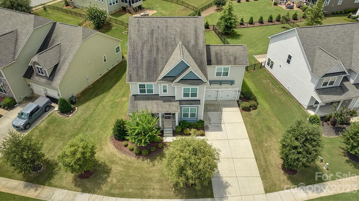 Move in ready spectacular home in heart of Lake Wylie with fenced backyard,screened in porch and rocking chair front porch!5 bedrooms and 4 1/2 baths!  Home offers a downstairs bedroom and bath for multi generational needs and 4 bedrooms upstairs.  The master bedroom is awesome with sitting room AND a gas fireplace for ambiance! The downstairs is completed by formal dining room, flex space/living room with French doors, huge great room with lots of natural light and window & gourmet kitchen.  The kitchen island is 14 feet long with tons of counter/work space & storage for the cook in the family! This home has a wonderful flow and can accommodate lots of people for entertaining. The Handsmill neighborhood has outstanding amenities and offers mountain like lodge clubhouse, olympic pool, playgrounds, boat slips and is gated.  Easy commute to Charlotte, Rock Hill, Belmont, York & Clover.  In the awards winning Clover School District!  What more can you want!Welcome home and to Lake Wylie!