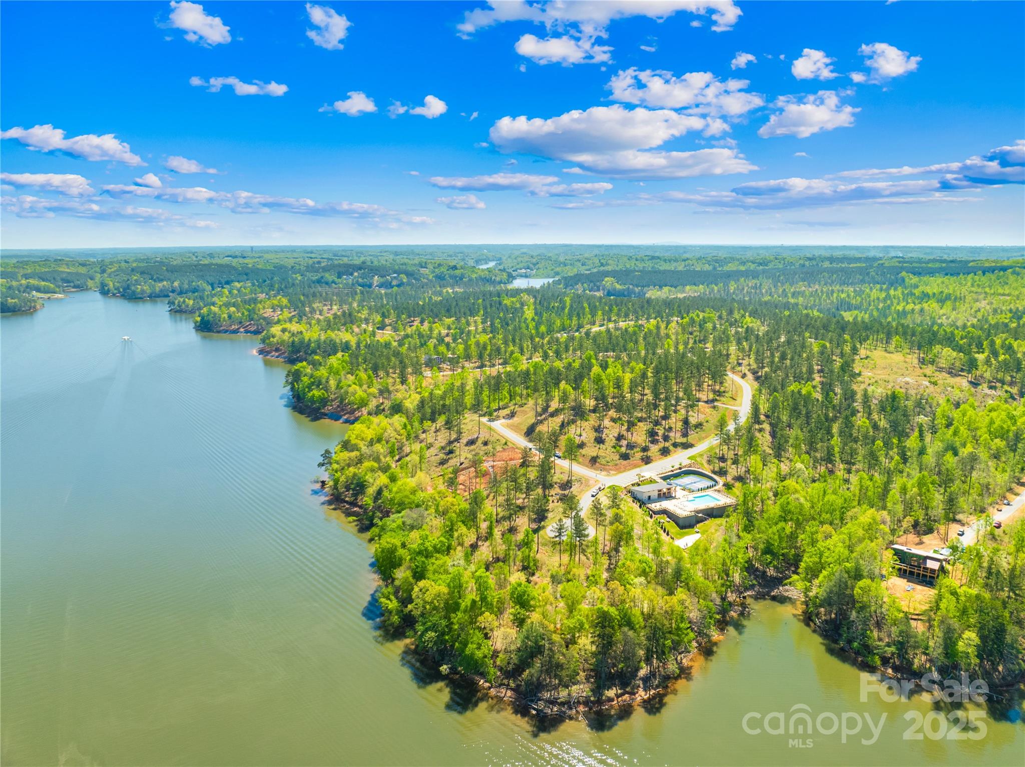 Priced to sell! Incredible opportunity to bring your own builder & design your custom dream home on Lake Rhodhiss. Lot number 37 is located in the beautiful new Lakeside Reserve Community in Connelly Springs, NC. This 1.51 acre lot is situated nicely on a cul-de-sac street with a beautiful creek view in the back. Lakeside Reserve is an amenity rich gated community that features a kayak launch, hiking trails, boat storage, a community pool, pickleball courts, a sandy beach, and a gathering area with an outside fireplace. Experience the best of lakeside living, stunning natural surroundings, and exclusive amenities all within convenient access to Hickory, Charlotte, and Asheville.