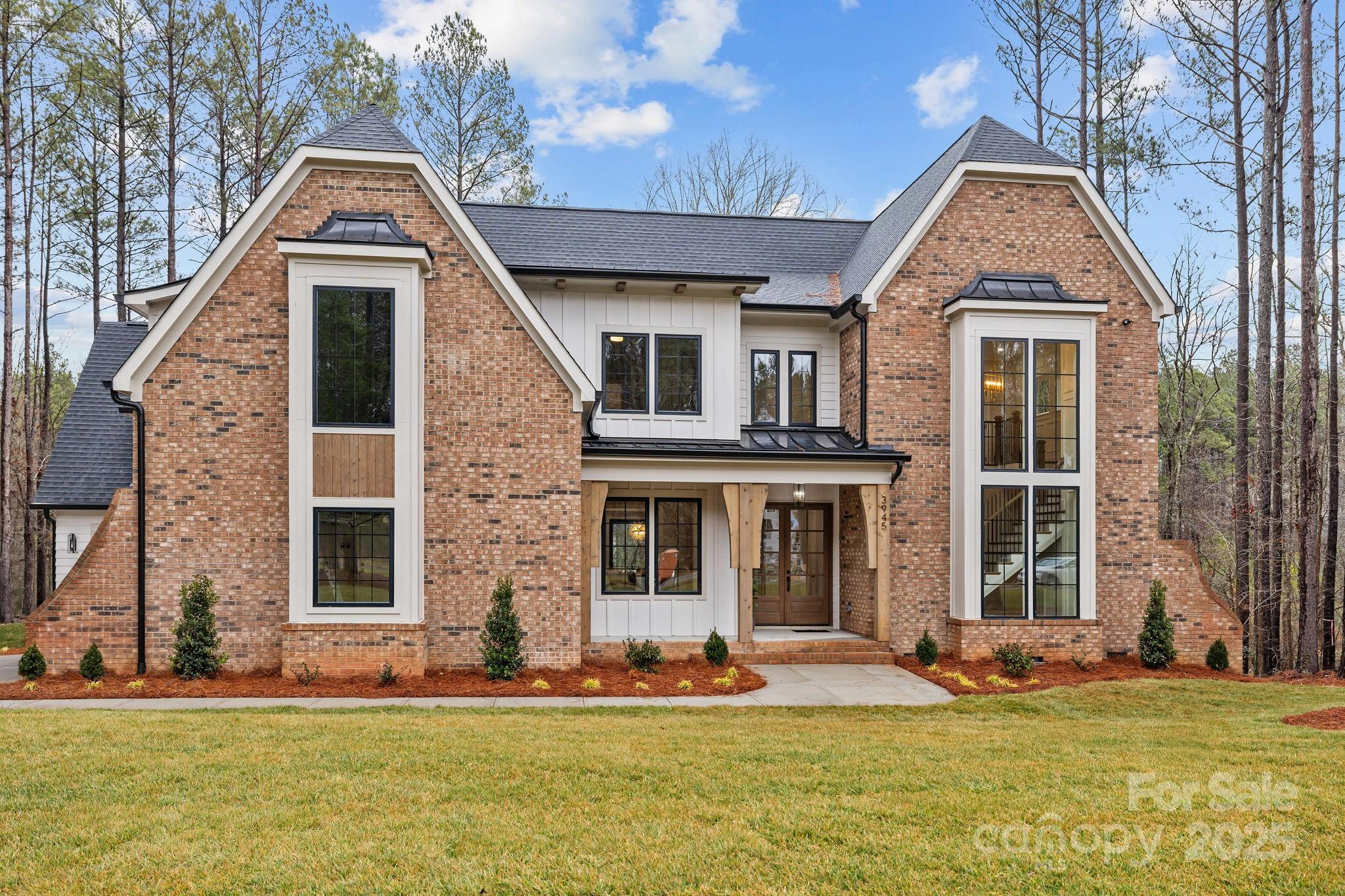 Enjoy the finer things in life in Riverchase Estates, an unbelievably lush retreat you can call home. Custom home is a seamless blend of spaces. Natural cedar posts grace entryway. Tower of windows embracing the grand floating staircase, filling with sunlight. Kitchen is a culinary dream, from custom cabinetry to high-end fixtures. Grand, oversized kitchen island serves as the centerpiece. White oak beams accentuate primary and great room. Vestibule leads to primary suite, offering privacy off main level. Sitting area in primary room, showcasing the nature preserve. Primary bathroom has double vanities and gigantic walk-in shower. Every detail carefully planned. Surround sound in primary, back porch and bonus room. Indoor and Outdoor gas fireplaces. Secondary bedroom with full bathroom on main level. Additional bedrooms with full bathrooms upstairs. Three car garage. Large, cul-de-sac lot. Everything you could imagine to live the ace lifestyle, including million-dollar amenities.