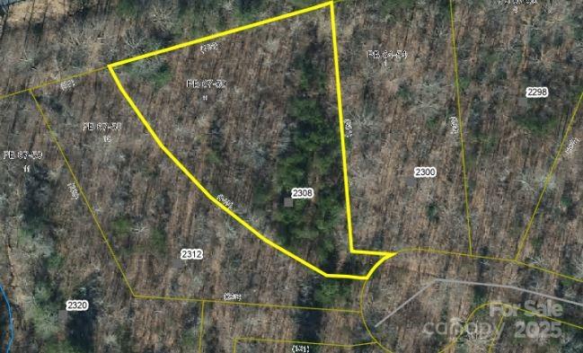 PRIME BUILDING LOTS! Approved for doublewides and modular homes in excellent Morganton location behind Food Lion, just off I-40 Exit 103. These wooded lots range from 0.5 to 2.4 acres with level, build-ready terrain. Select lots feature pre-approved 3-bedroom septic permits ( already pre perked buyer is responsible for getting septic permit on this lot) , with all parcels offering county water access and underground utilities. Road to be paved. Perfect opportunity for your new home in a convenient location with easy interstate access. These parcels offer the ideal blend of natural setting with nearby shopping and amenities. Choose your lot size to suit your needs - build now or hold for future development. Properties like these with utilities and approvals in place are increasingly rare! Call today to select your preferred parcel before they're gone.  The  seller is allowing tree and brush buring on lot 9 and 10 to reduce clearing cost all listing agent on details