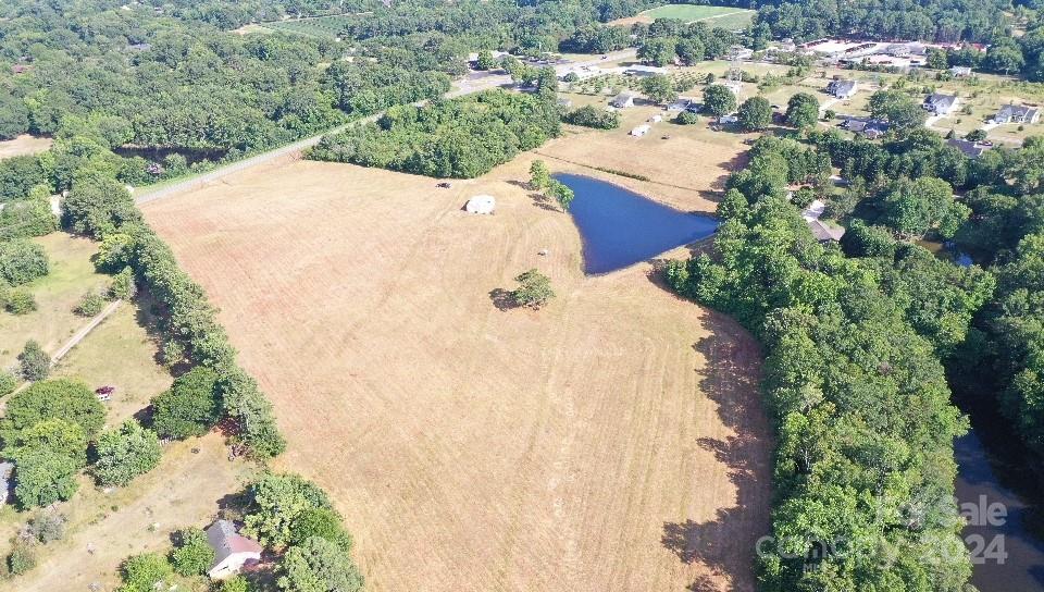 Beautiful piece of cleared land in York County ready to build your dream home.  Approx. 2.5 acre mature pond.    The lot is completely fenced.  The land includes an old metal pole barn that holds no value.
