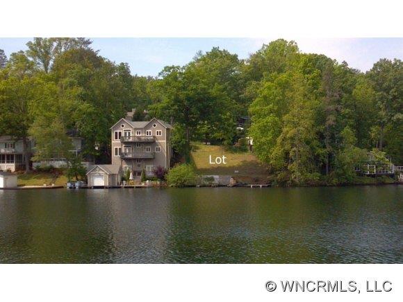 Think WaterFront Lifestyle. Prime lot on Lake Lanier 1st basin.  Make plans to build your get-away and enjoy Lake Living.  3 bedroom septic permit approval -unique for building today on the lake and 3 docks can be built. Owner house plans available to be modified to lot.  Join those who kick back, relax and play on the lake.