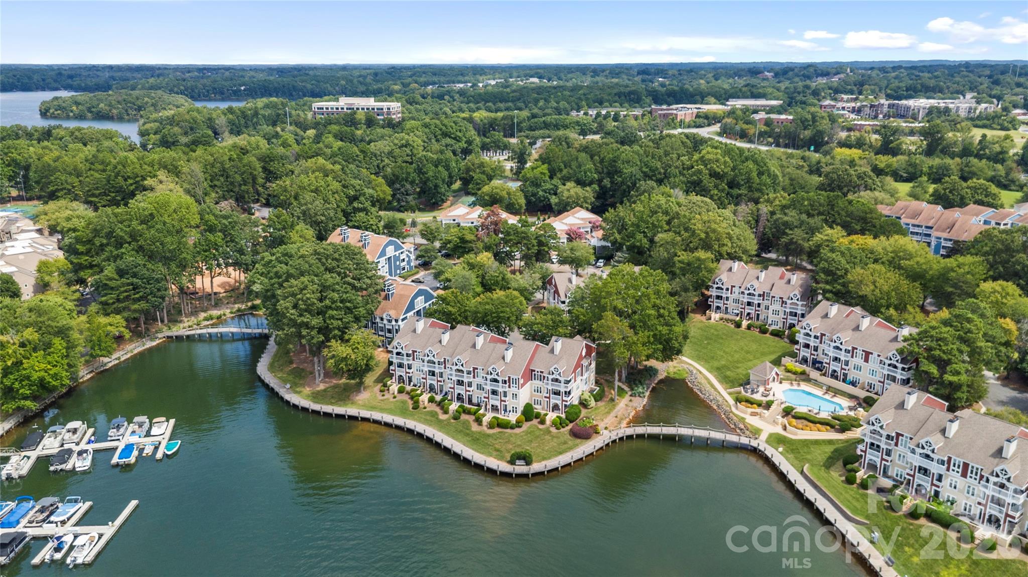 Beautiful 2-bedroom, 2-bathroom waterfront condo in the highly sought-after Davidson Landing! This rare ground-level end unit offers stunning views of Lake Norman and the pool, with a large waterfront porch accessible from both the living area and the primary bedroom. Step outside and enjoy your own private walkway that leads directly to the pool for the ultimate indoor–outdoor lifestyle.

Enjoy peace of mind with recent updates including a new HVAC system in 2022, full exterior siding replacement in 2023, brand-new gutters, and fresh exterior paint, enhancing curb appeal. Community amenities include the lake, leased boat slips, outdoor pool, pickleball courts, tennis courts, basketball, walking and fitness trails, and a waterfront restaurant. Just minutes from downtown Davidson’s vibrant shops and restaurants, this condo blends comfort, convenience, and true resort-style living.