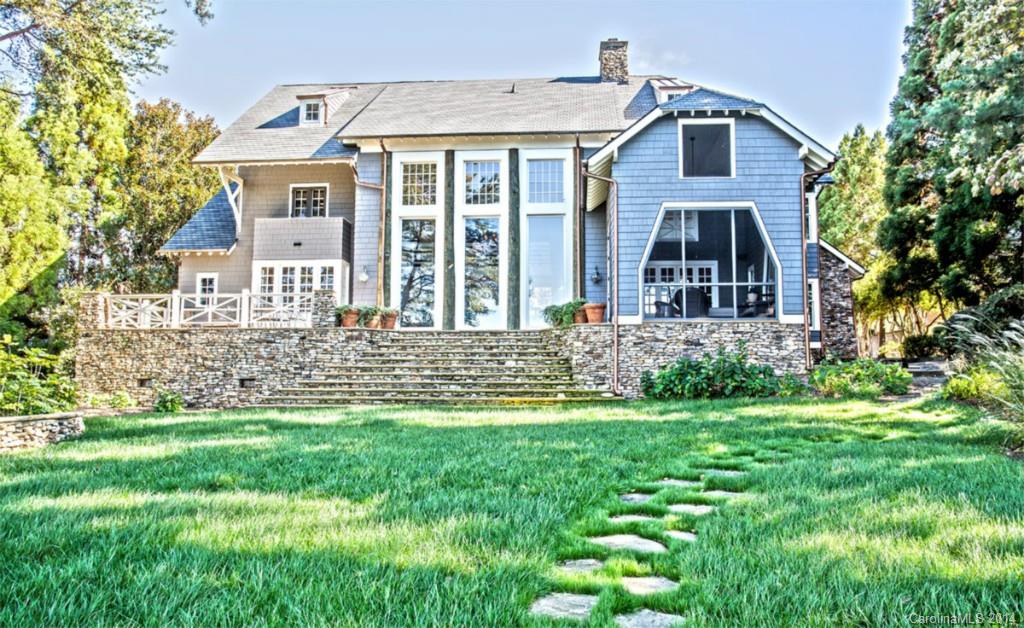 Beautiful Open floor plan with breathtaking views of Lake Norman.  This exceptionally designed home features architectural details and natural materials unlike any other.  Wood and ceramic floors and a floor to ceiling stone fireplace.  New dock has the details of the home.  3rd floor is the 2nd living quarters over the garage connected to the house and also having a separate entrance.  Large walk up attic space that could be finished for extra living space.   This you must see to appreciate.