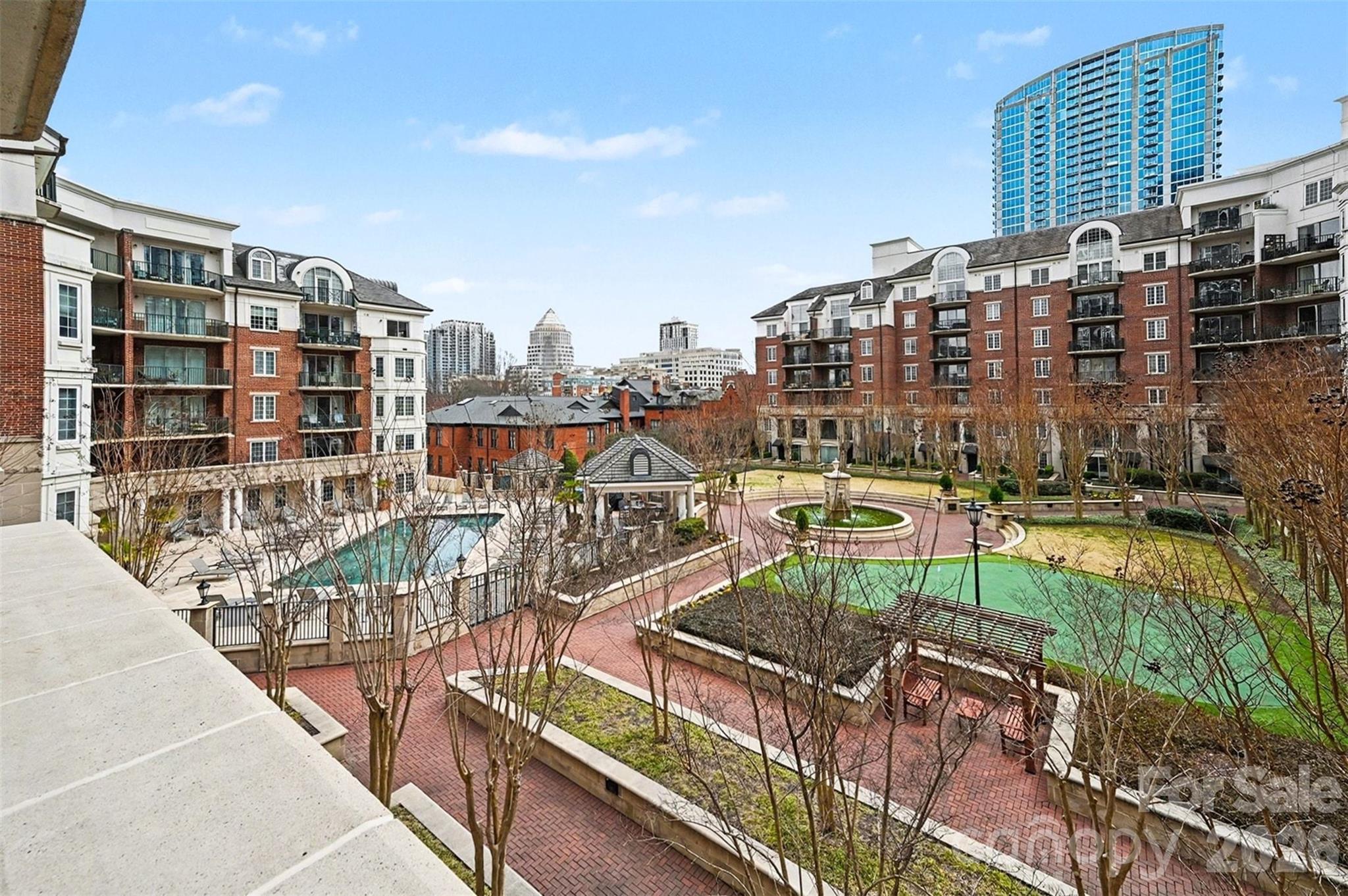 Step into the energy of Uptown Charlotte while enjoying the comfort of a quiet retreat in this beautifully maintained 2-bedroom, 2-full bathroom residence at Fifth & Poplar. From your private balcony, unwind with peaceful courtyard views and subtle glimpses of the Charlotte skyline a rare combination that delivers both city excitement and everyday serenity.

Inside, thoughtful conveniences make city living easy. The unit includes a secured parking space along with a private additional storage area, an uncommon advantage in Uptown that provides valuable extra room for the things you want close by but out of sight.

Life at Fifth & Poplar feels more like a private club than a condominium community. Residents enjoy resort-style amenities including a sparkling pool, fitness center, lounge, game room, private coffee and tea bar, putting green, and secure building access with a 24-hour onsite concierge.

Recent improvements add even more peace of mind, including a new roof installed in 2024, patio resealed and inspected in 2025, a new HVAC system in 2024, and a new water heater in 2023.

And the location? Blocks from Uptown Charlotte’s best dining, entertainment, parks, and cultural attractions giving you the freedom to enjoy everything the city offers while coming home to a space that feels calm, comfortable, and truly yours.