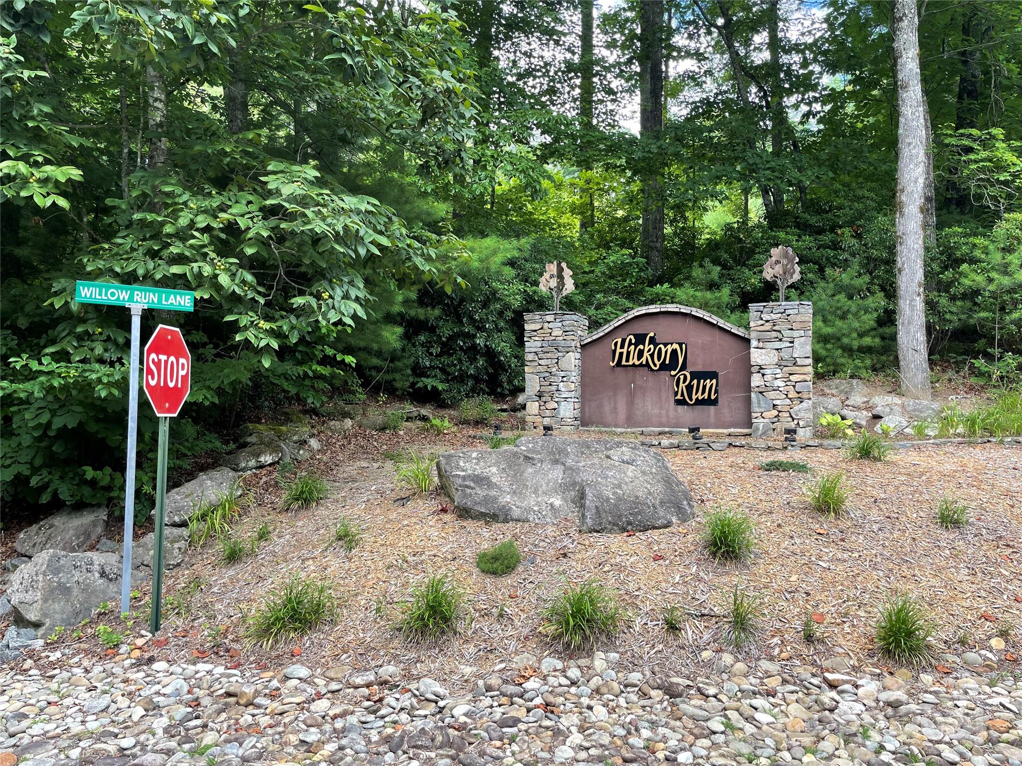 Get ready to build your mountain home! This lot is located inside a small gated development that is conveniently located off of Hwy 25 that provides easy access to Greenville, Asheville, and Hendersonville. The lot has been prepped for a basement build and has some winter views and a small stream along the bottom side. Lot is located just inside the gate. The community pavillion is located just inside the gate on the right. With a 4 bedroom septic approval already done this truly is ready build on today!