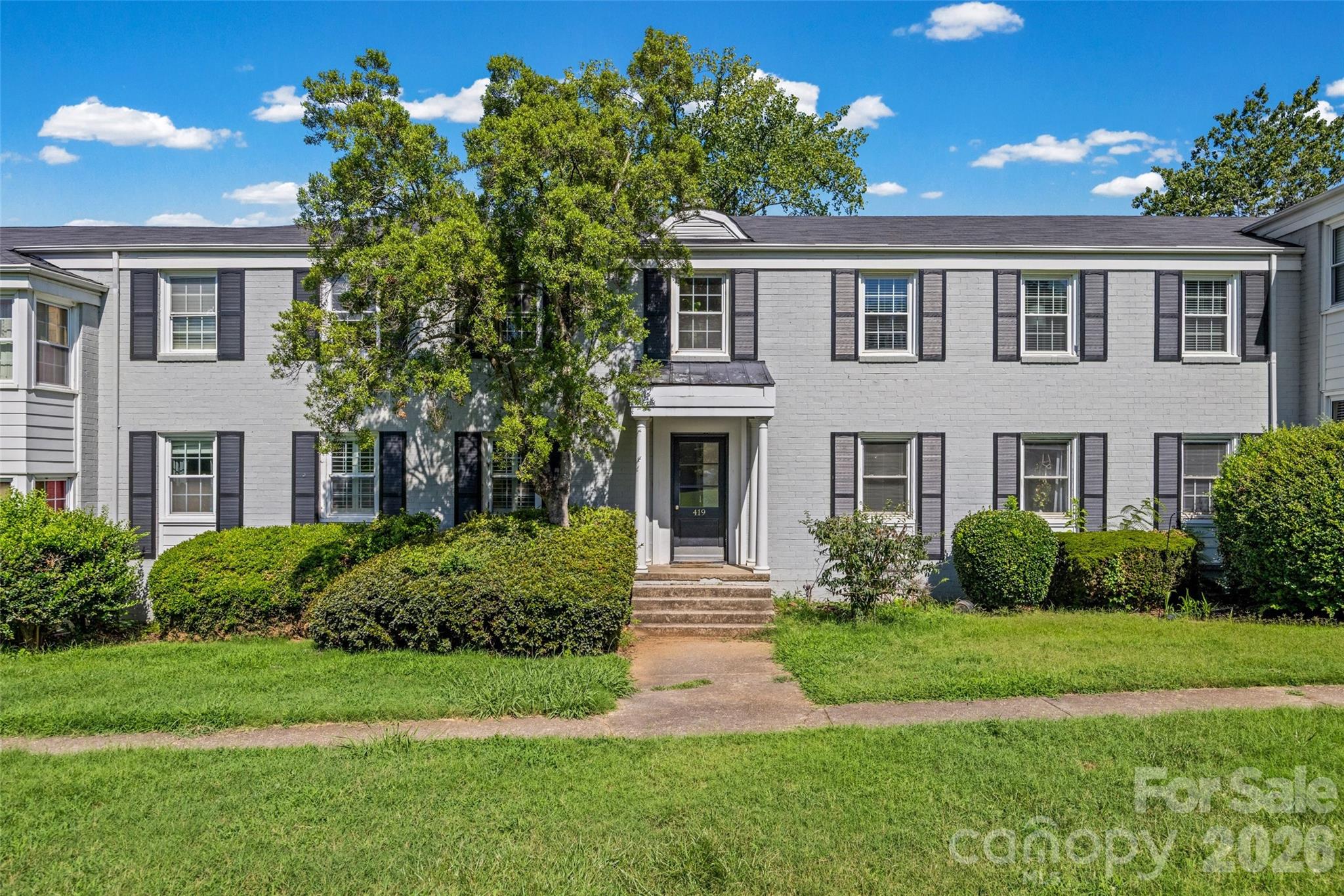 Desirable top floor 2 bedroom condo in Selwyn Village! This wonderful unit features neutral paint, hardwood floors, nice natural light, desirable layout and abundant charm and character in sought after Myers Park. Lovely living room with wonderful built-in shelving. White kitchen with tile flooring, window over sink, tile backsplash and granite countertops with door to back entrance! Large pantry storage / laundry closet. Two bedrooms and neutral bathroom with tile surround shower/tub combo and beadboard detailing. Great location within the complex, offering both privacy and convenience and steps away from convenient greenway access. Sprawling lawn / green space in front of condo. Don’t miss this rare opportunity! Move in ready! Walking distance to Selwyn Ave Shops, Montford bars/restaurants, Park Road Shopping Center! Seller has paid assessment in full for recent new paving in community.