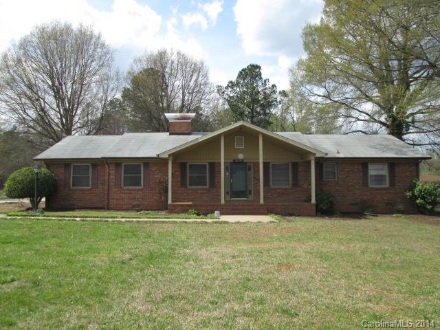 Spacious all brick ranch with plenty acreage. Large bedrooms and spacious closets.  Den features brick fireplace, door that leads to patio and built in bookshelves. Open living room and dining room. Carport features storage closet the length of the carport.  Plenty of room to backup in drive way and plenty of parking. Close to I485 and I85.