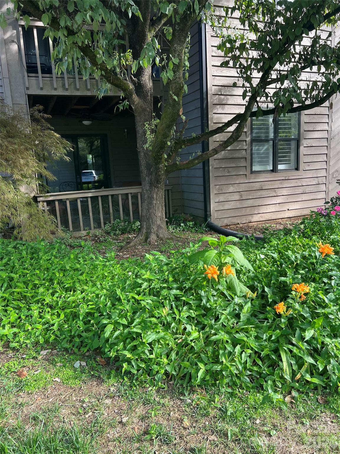 Welcome to Lake Wylie Woods,  4134 Charlotte Hwy, Lake Wylie, SC! This charming property boasts a spacious layout with 2 bedrooms, 2 bathrooms, covered front porch, private back patio, plantation shutters, fireplace