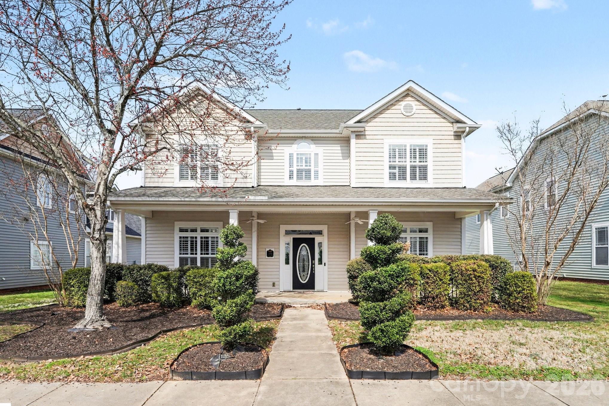 Welcome to this beautifully maintained and spacious home in the highly desirable Bonterra community in Indian Trail. Offering 5 bedrooms, 3 full bathrooms, and 1 half bathrooms, this thoughtfully designed floor plan provides exceptional space for both everyday living and entertaining. The main level features rich hardwood floors, detailed moldings, and an open layout filled with natural light. The updated kitchen is the centerpiece of the home with granite countertops, stainless steel appliances, abundant cabinetry, a large island with seating, and a built-in wine refrigerator. The kitchen flows seamlessly into the breakfast area and spacious great room, creating the perfect gathering space. The primary suite is located on the main floor and offers a comfortable retreat with a large walk-in closet and private ensuite bath. Upstairs, you’ll find additional bedrooms, a versatile loft area, and an expansive bonus room large enough to accommodate a media room, game room, or recreation space. The generous layout offers flexibility for a variety of lifestyles.
Outdoor living is just as inviting with a large screened porch overlooking the fenced backyard and custom patio with fire pit — an ideal setting for relaxing evenings or entertaining. Great community amenities including a pool, clubhouse, and playground. With generous living spaces, desirable community features, and room to grow, this home offers the perfect blend of comfort, functionality, and lifestyle.