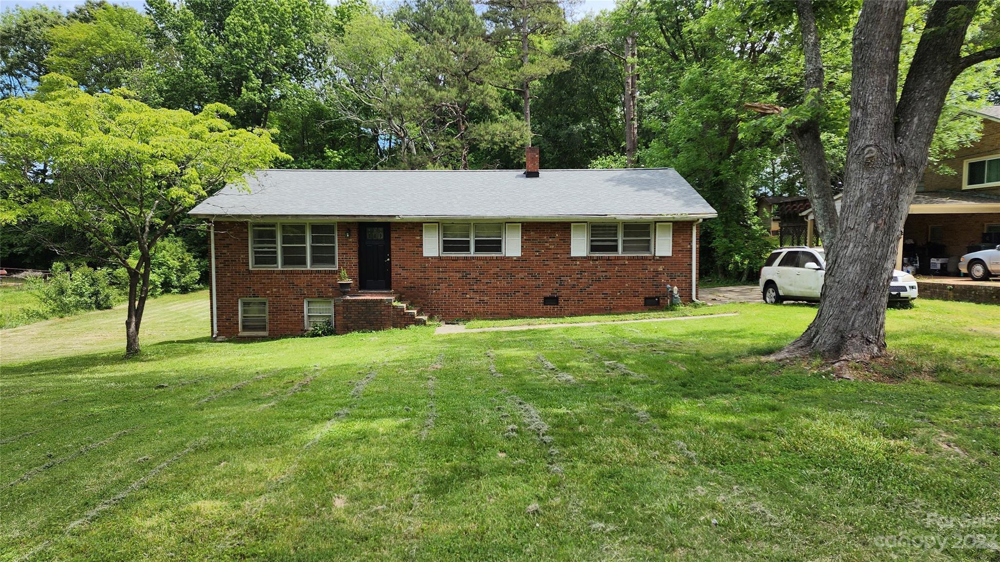 Seller is calling for highest and best by 10am on May 25th.
Welcome to this charming all brick home located in Rock Hill, SC. This property is a great opportunity for those looking to invest in a fixer-upper. The home features classic brick architecture with 3 bedrooms, 1.5 baths, and a walk-out, partially finished basement that is just waiting to be brought back to life. Surrounded by mature trees and a large yard, this property offers the perfect canvas for your personal touch and creativity. With its prime location close to I-77 and Cherry Park in Rock Hill, you'll enjoy easy access to local shops, restaurants, and entertainment. Don't miss out on the chance to make this house your dream home. Home is sold As Is.