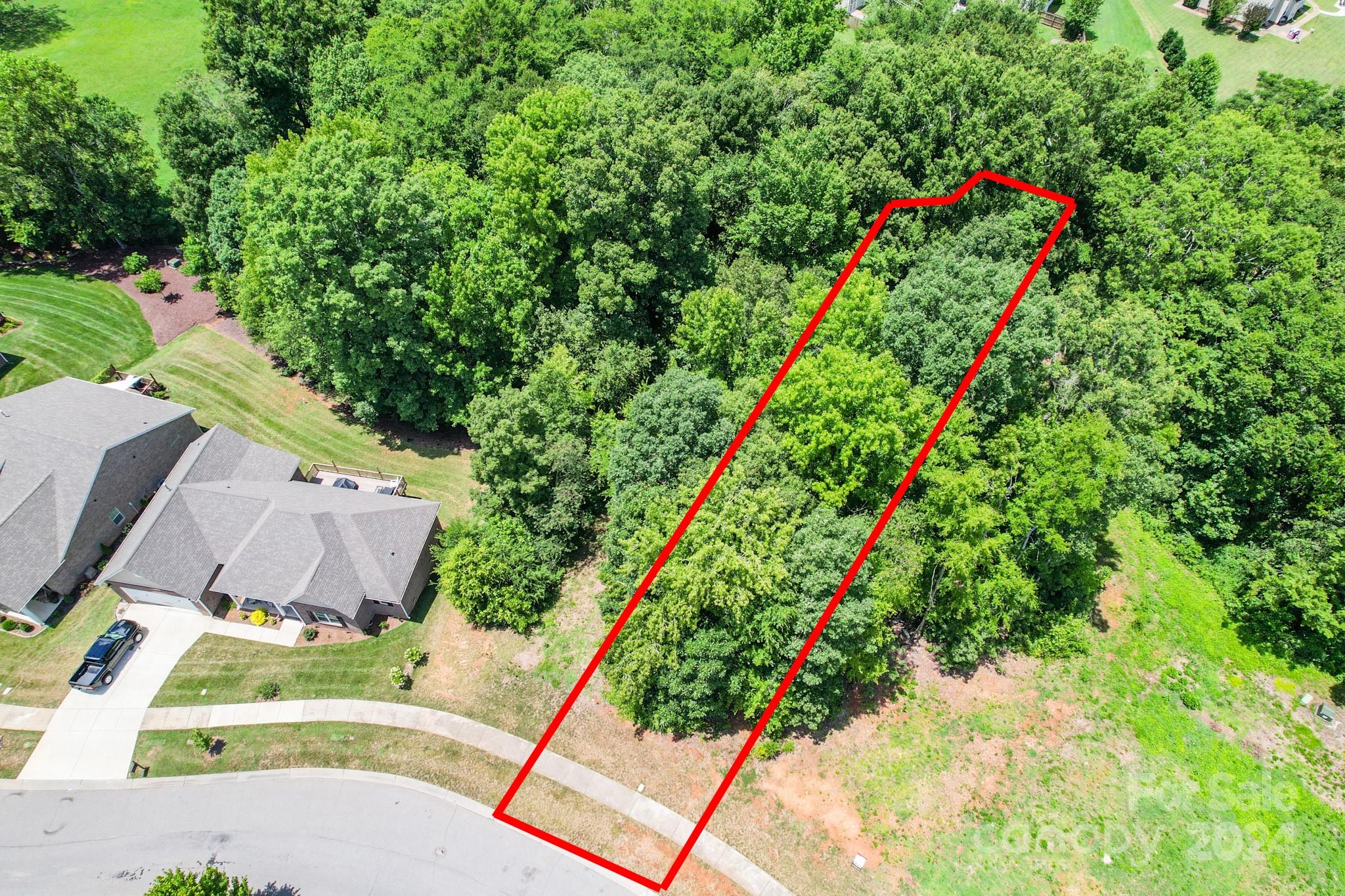 Build your dream home this gorgeous .26 acre homesite in desirable St James.  This well established neighborhood in conveniently located just off of 74 and is convenient to shopping, restaurants, and activities.  City Water and Sewer available.  The adjacent homesite, 2919 Santiago Circle is also available!