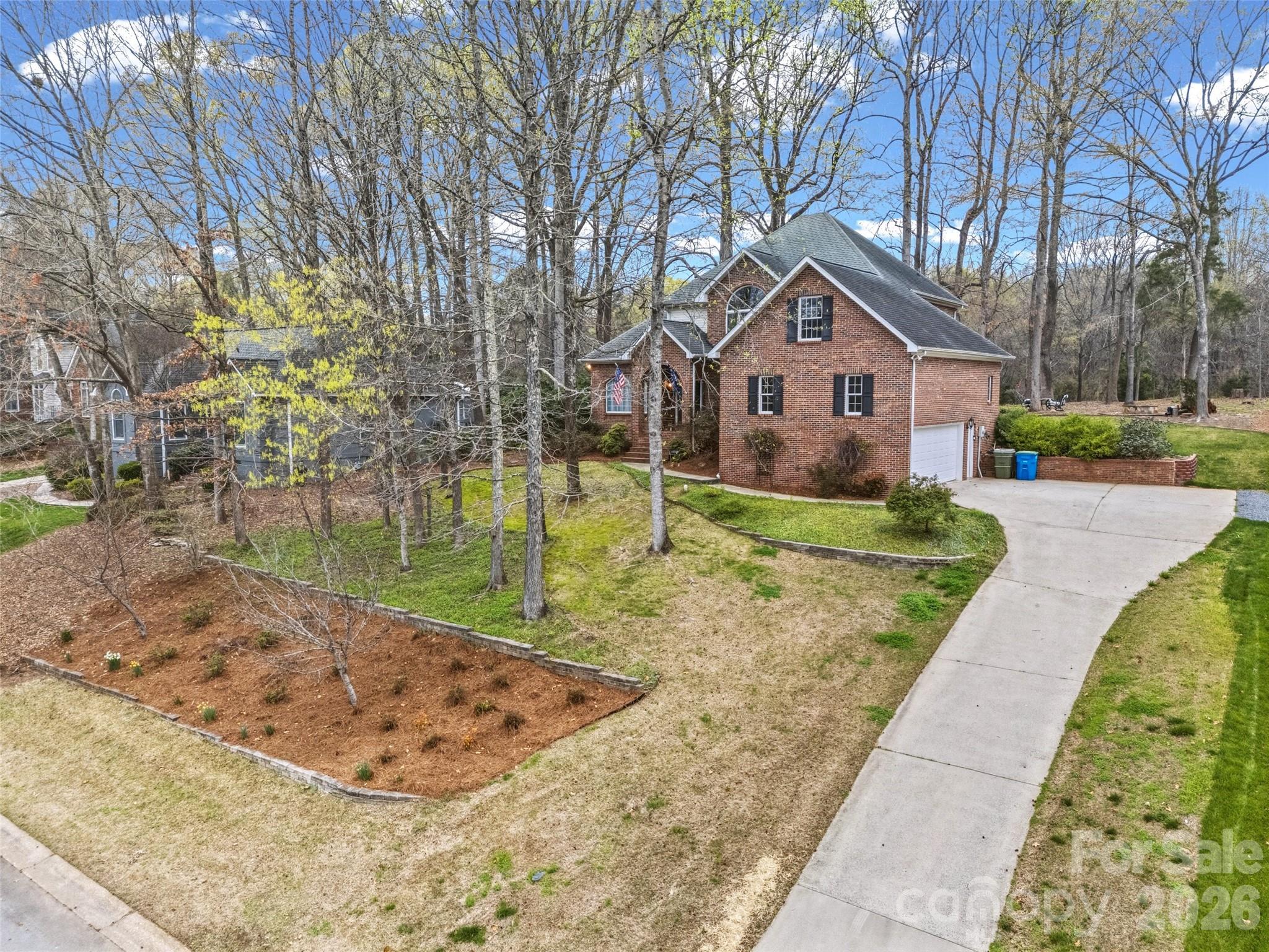 Tucked away no HOA in a quiet cul-de-sac, this stunning full-brick home sits in the sought-after Whiteville Park community,  4-bedroom, 3-bathroom offers nearly half an acre of private outdoor bliss offering an expansive backyard complete with a fire pit for year-round entertainment.
Step through the grand foyer to find an open, light-filled layout featuring gleaming hardwoods throughout the main level. The gourmet kitchen is a chef’s delight, equipped with a central island, walk-in pantry, Tankless Water Heater and yards of countertop space perfectly positioned for hosting. The main-level primary suite offers ultimate convenience, while the second story features three secondary bedrooms and a full bath. Additional highlights include a massive walk-in attic and participation in the Duke Power energy program, ensuring modern efficiency in a classic, timeless home. This home was built for making memories. Don't miss this gem!