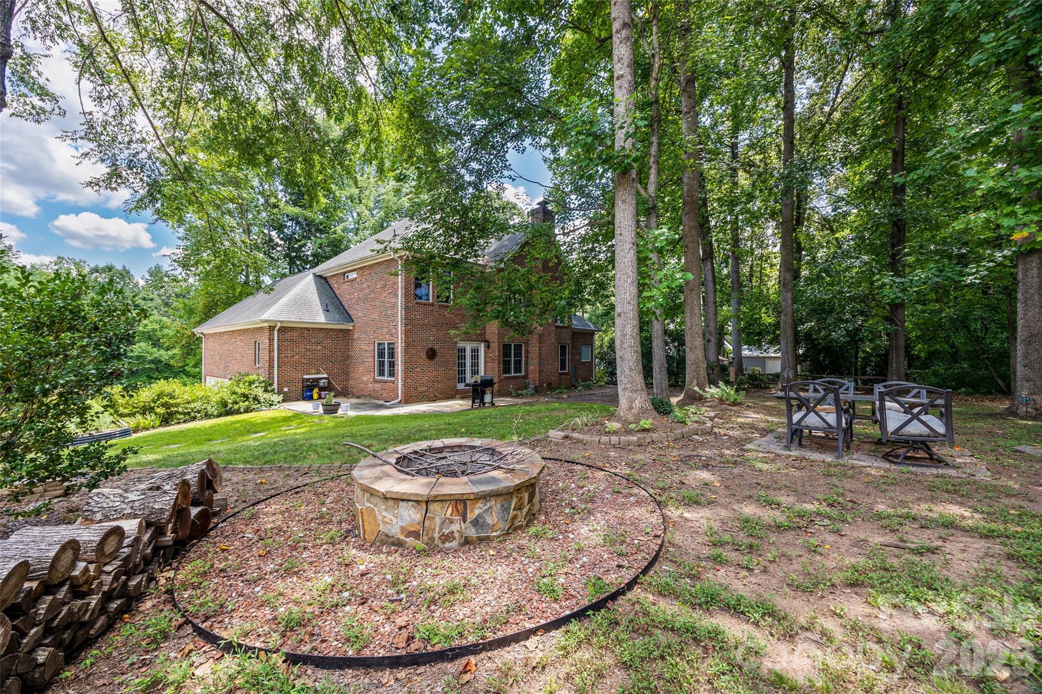 Tucked away in a quiet cul-de-sac with no HOA this stunning full-brick home sits in the sought-after Whiteville Park community,  4-bedroom, 3-bathroom offers nearly half an acre of private outdoor bliss offering an expansive backyard complete with a fire pit for year-round entertainment.
Step through the grand foyer to find an open, light-filled layout featuring gleaming hardwoods throughout the main level. The gourmet kitchen is a chef’s delight, equipped with a central island, walk-in pantry, Tankless Water Heater and yards of countertop space perfectly positioned for hosting. The main-level primary suite offers ultimate convenience, while the second story features three secondary bedrooms and a full bath. Additional highlights include a massive walk-in attic and participation in the Duke Power energy program, ensuring modern efficiency in a classic, timeless home. This home was built for making memories. Don't miss this gem!