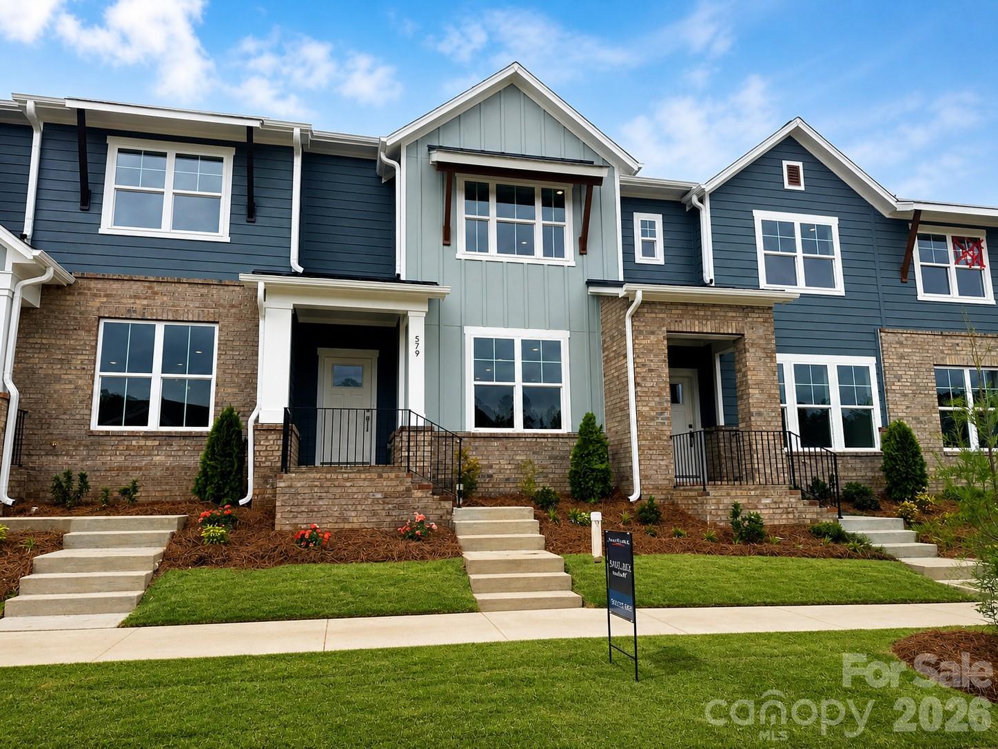 June Move-In! This quick-move-in home by David Weekley Homes, is under construction in Rock Hill’s newest community, Hardy Pond. This thoughtfully designed interior-unit townhome features a desirable 2-car rear-load, alley-fed garage, adding both charm and functionality.

The exterior showcases extensive brick and Hardie® board siding, creating timeless curb appeal that sets these townhomes apart.

Inside, you’ll find luxury vinyl plank flooring throughout the first floor and on the stairs, offering both durability and style. The beautifully appointed kitchen includes upgraded cabinetry, quartz countertops, a tile backsplash, stainless steel gas range/cooktop, and MDF shelving in the pantry — just a few of the elevated finishes that make this home stand out from the rest.

Built with David Weekley Homes’ renowned dedication to quality craftsmanship and attention to detail, this quick move-in opportunity blends comfort, design, and convenience.

Hardy Pond offers a prime location within walking distance to restaurants, grocery stores, and everyday conveniences — making it easy to enjoy everything Rock Hill has to offer.