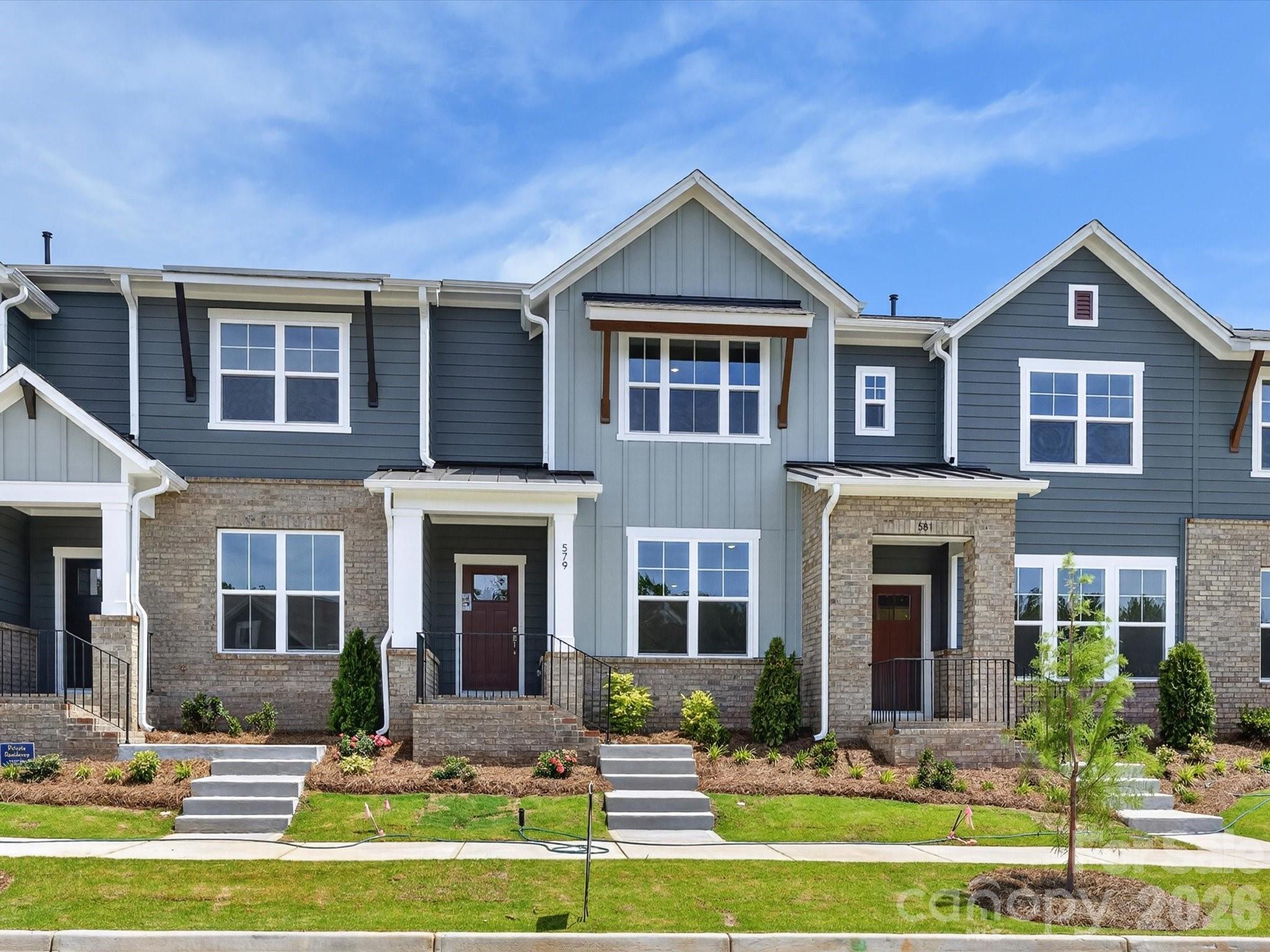June Move-In! This quick-move-in home by David Weekley Homes, is under construction in Rock Hill’s newest community, Hardy Pond. This thoughtfully designed interior-unit townhome features a desirable 2-car rear-load, alley-fed garage, adding both charm and functionality.

The exterior showcases extensive brick and Hardie® board siding, creating timeless curb appeal that sets these townhomes apart.

Inside, you’ll find luxury vinyl plank flooring throughout the first floor and on the stairs, offering both durability and style. The beautifully appointed kitchen includes upgraded cabinetry, quartz countertops, a tile backsplash, stainless steel gas range/cooktop, and MDF shelving in the pantry — just a few of the elevated finishes that make this home stand out from the rest.

Built with David Weekley Homes’ renowned dedication to quality craftsmanship and attention to detail, this quick move-in opportunity blends comfort, design, and convenience.

Hardy Pond offers a prime location within walking distance to restaurants, grocery stores, and everyday conveniences — making it easy to enjoy everything Rock Hill has to offer.