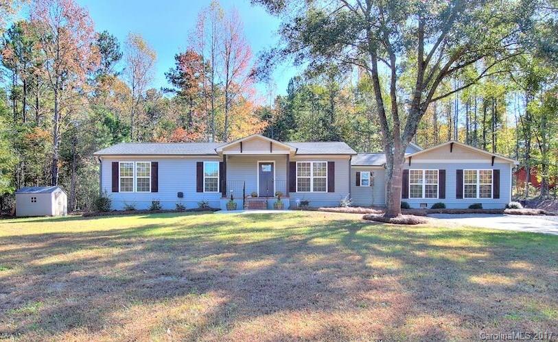 Your private, peaceful retreat awaits, in the heart of it all! Unique, craftsman style ranch nestled on almost 2 acres! Completely remodeled! Bright, airy, open kitchen w/ subway tile, light granite & cabinetry, w/ large island for entertaining.  Master suite w/ super shower & upgraded tile work. Large mud room & laundry! Endless possibilities in huge bonus room/4th bed, featuring full bath & closet. Supersized garage w/built-ins for all storage needs. Minutes from Ballantyne! Low SC taxes!