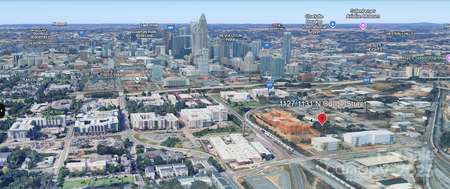 Introducing 1127 and 1131 N College Street — two powerful infill development lots that can be purchased separately or together ($750k). Nestled just off North Tryon, these parcels offer rare proximity to Uptown with abundant momentum pushing outward from the urban core. Directly across the street sits the brand-new J Optimist Park apartment building—350 upscale units bringing new residents and density right to your future doorstep. 

Over the last few years, the corridor has been electrified by transformative projects: Optimist Hall’s adaptive reuse brought food halls, creative office, restaurants, and foot traffic to the neighborhood. 

Camp North End’s ongoing Phase 2 includes 120,000 sq ft of Class A office and 20,000 sq ft of retail/amenity space, further anchoring the area as a destination for work, culture, and entertainment. 

Raleigh Street’s North Tryon corridor is showing increased interest from developers, as evidenced by a planned 275-unit apartment with retail slated for 2027 near Dalton Avenue and Tryon, and new nodes of indoor recreation (pickleball, climbing) emerging nearby. 

These lots are ideally positioned to ride this wave. Walkable to the 9th Street and Parkwood light-rail stations, with compelling location to the North Tryon artery and easy connectivity to NoDa, Uptown, and neighboring creative hubs.

If you’re looking for a development plot with story, momentum, and infrastructure in place, both 1127 & 1131 N College Street are ready for your blueprint.