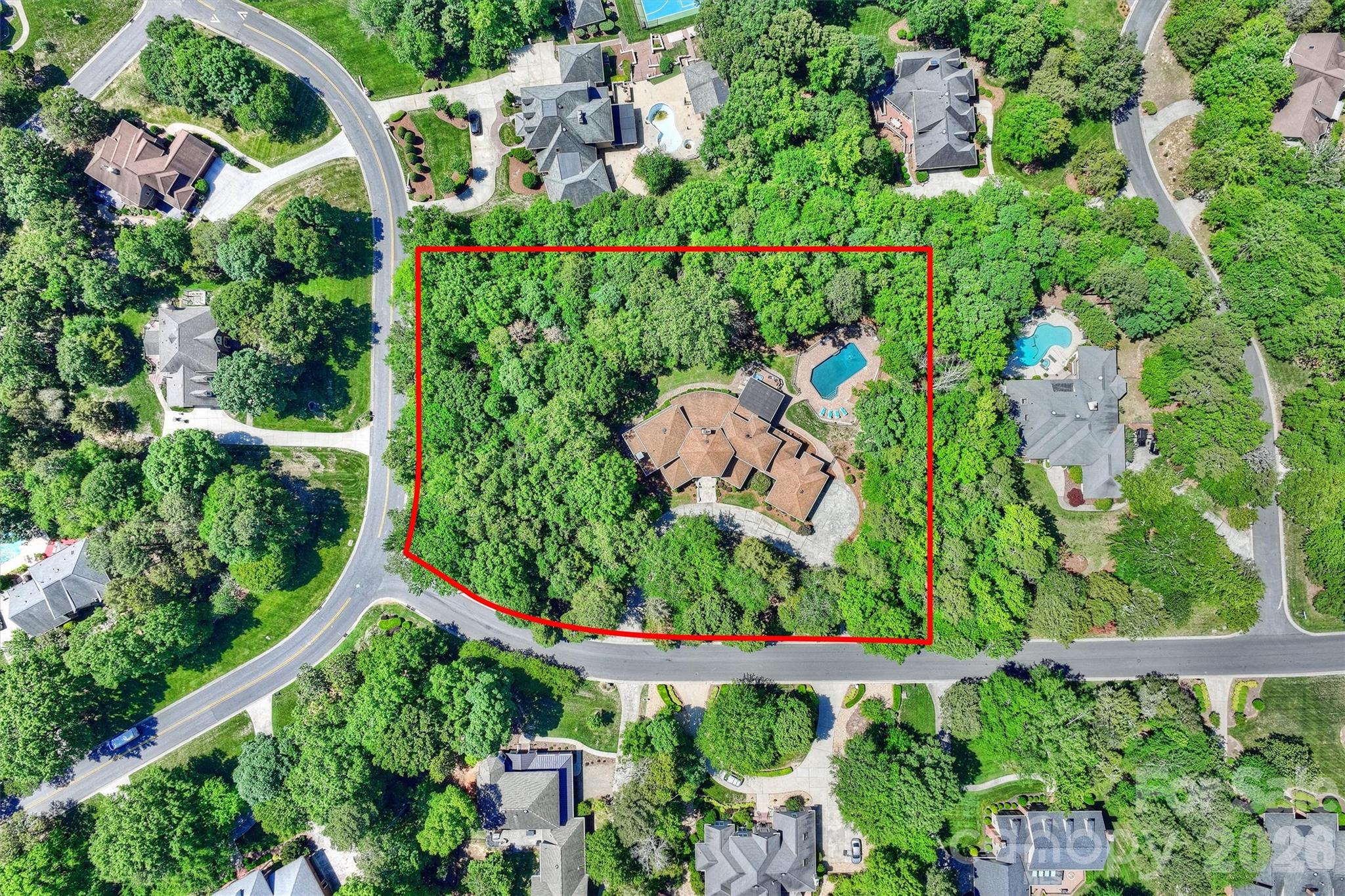 Situated on a rare double lot totaling 2.29 private acres in Providence Plantation, this property is actually two separate lots, lots 4 and 5 per the original plat map for the community. This is a developers dream to build two custom homes on this property. Located in one of south Charlotte’s most established neighborhoods known for large wooded lots and highly rated schools, this property also presents a rare redevelopment opportunity due to its double-lot configuration A truly one-of-a-kind Providence Plantation property offering a homeowner or developer the opportunity to build two custom homes on this property. Also listed as a single family home, see MLS 4379817 for more details.  Check out https://www.pp-hoa.org/ for more information.